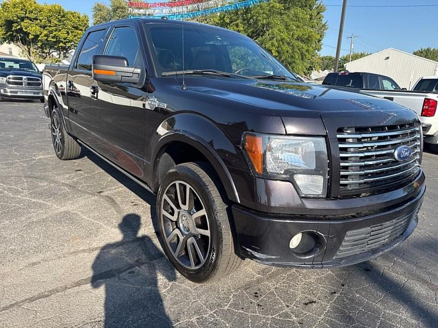 2010 BLACK /BROWN Ford F-150 Lariat SuperCrew 5.5-ft. Bed 4WD (1FTFW1EV1AF) with an 5.4L V8 SOHC 24V FFV engine, 4-Speed Automatic transmission, located at 3304 Woodville Road, Northwood, OH, 43619, (419) 210-8019, 41.612694, -83.480743 - Your #1 Destination for Auto Loans and mdash;No Matter Your Credit!At our dealership, we believe everyone deserves the opportunity to drive their dream car and mdash;whether you have good credit, bad credit, or no credit at all. With a wide selection of hundreds of cars, trucks, and SUVs, you'll fin - Photo#6
