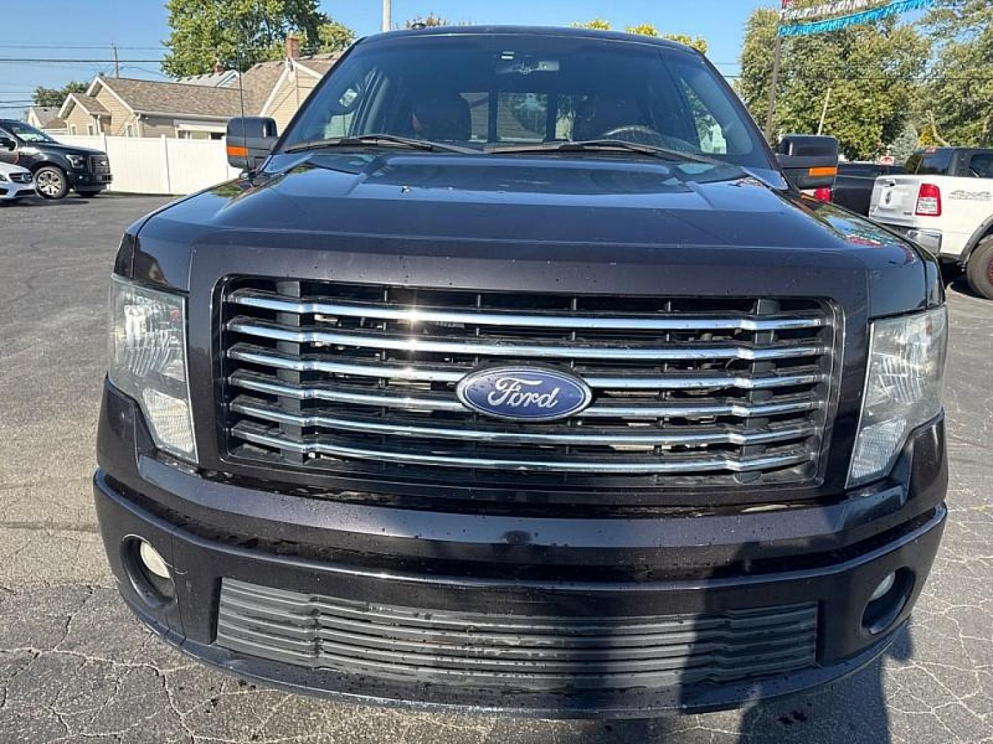 2010 BLACK /BROWN Ford F-150 Lariat SuperCrew 5.5-ft. Bed 4WD (1FTFW1EV1AF) with an 5.4L V8 SOHC 24V FFV engine, 4-Speed Automatic transmission, located at 3304 Woodville Road, Northwood, OH, 43619, (419) 210-8019, 41.612694, -83.480743 - Your #1 Destination for Auto Loans and mdash;No Matter Your Credit!At our dealership, we believe everyone deserves the opportunity to drive their dream car and mdash;whether you have good credit, bad credit, or no credit at all. With a wide selection of hundreds of cars, trucks, and SUVs, you'll fin - Photo#7