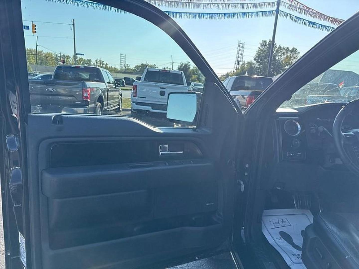 2010 BLACK /BROWN Ford F-150 Lariat SuperCrew 5.5-ft. Bed 4WD (1FTFW1EV1AF) with an 5.4L V8 SOHC 24V FFV engine, 4-Speed Automatic transmission, located at 3304 Woodville Road, Northwood, OH, 43619, (419) 210-8019, 41.612694, -83.480743 - Your #1 Destination for Auto Loans and mdash;No Matter Your Credit!At our dealership, we believe everyone deserves the opportunity to drive their dream car and mdash;whether you have good credit, bad credit, or no credit at all. With a wide selection of hundreds of cars, trucks, and SUVs, you'll fin - Photo#8