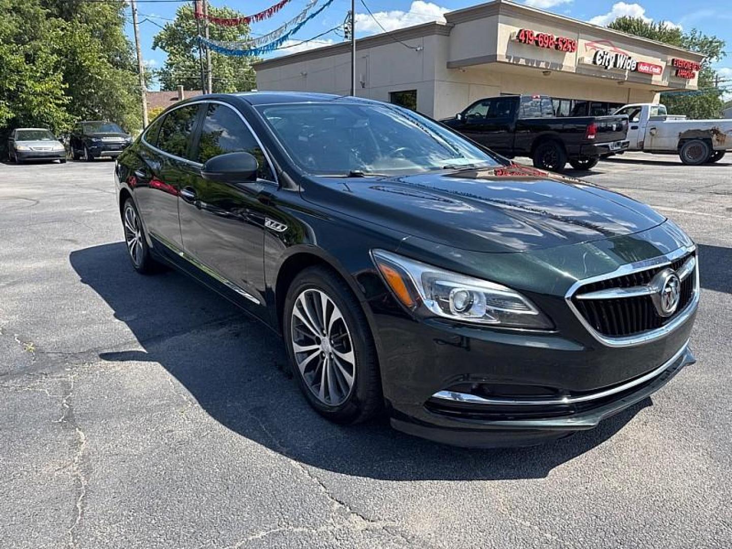 2017 GREEN /BLACK Buick LaCrosse Essence (1G4ZP5SS4HU) with an 3.6L V6 DOHC 24V engine, 8A transmission, located at 3304 Woodville Road, Northwood, OH, 43619, (419) 210-8019, 41.612694, -83.480743 - Your #1 Destination for Auto Loans and mdash;No Matter Your Credit!At our dealership, we believe everyone deserves the opportunity to drive their dream car and mdash;whether you have good credit, bad credit, or no credit at all. With a wide selection of hundreds of cars, trucks, and SUVs, you'll fin - Photo#6