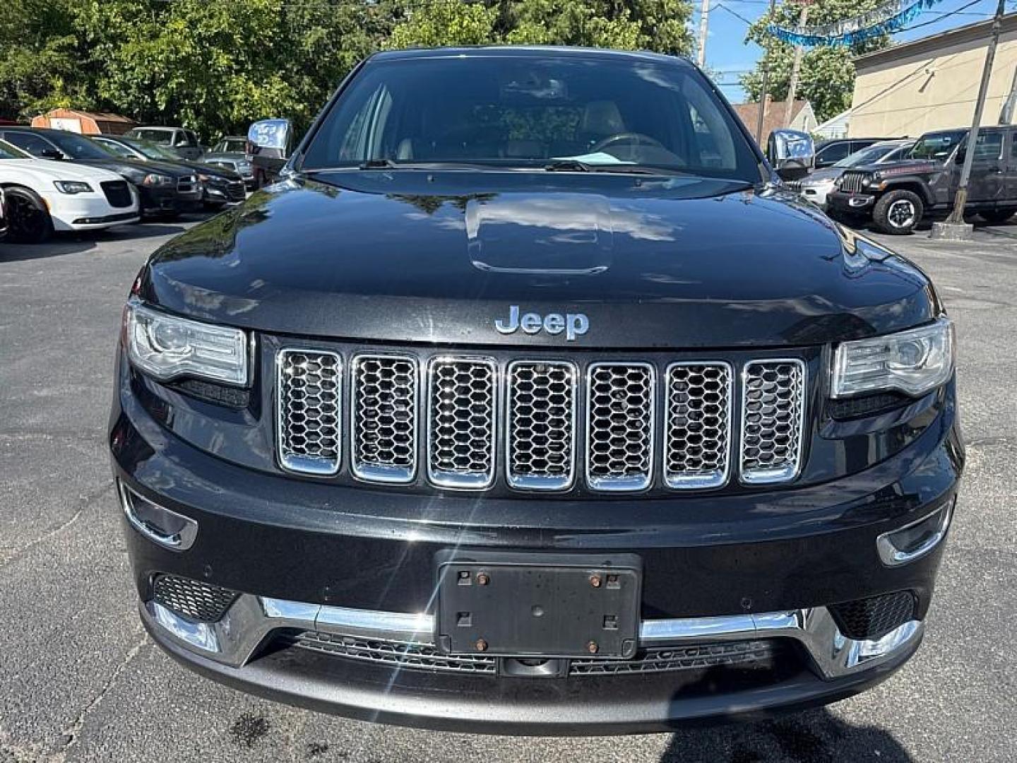 2014 BLACK /BROWN Jeep Grand Cherokee Summit 4WD (1C4RJFJG5EC) with an 3.6L V6 DOHC 24V engine, 5-Speed Automatic transmission, located at 3304 Woodville Road, Northwood, OH, 43619, (419) 210-8019, 41.612694, -83.480743 - Your #1 Destination for Auto Loans and mdash;No Matter Your Credit!At our dealership, we believe everyone deserves the opportunity to drive their dream car and mdash;whether you have good credit, bad credit, or no credit at all. With a wide selection of hundreds of cars, trucks, and SUVs, you'll fin - Photo#7