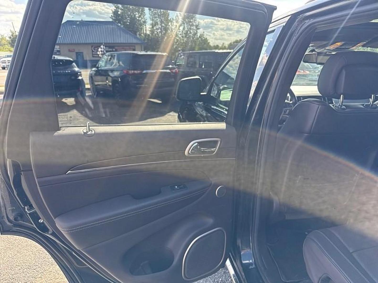 2014 BLACK /BROWN Jeep Grand Cherokee Summit 4WD (1C4RJFJG5EC) with an 3.6L V6 DOHC 24V engine, 5-Speed Automatic transmission, located at 3304 Woodville Road, Northwood, OH, 43619, (419) 210-8019, 41.612694, -83.480743 - Your #1 Destination for Auto Loans and mdash;No Matter Your Credit!At our dealership, we believe everyone deserves the opportunity to drive their dream car and mdash;whether you have good credit, bad credit, or no credit at all. With a wide selection of hundreds of cars, trucks, and SUVs, you'll fin - Photo#10