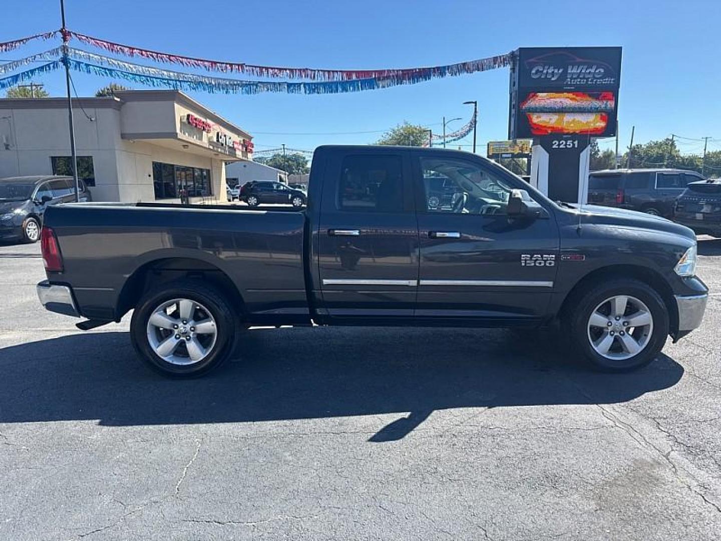 2018 GRAY RAM 1500 SLT Quad Cab 4WD (1C6RR7GM1JS) with an 3.0L V6 DOHC 24V DIESEL engine, 8A transmission, located at 3304 Woodville Road, Northwood, OH, 43619, (419) 210-8019, 41.612694, -83.480743 - Your #1 Destination for Auto Loans and mdash;No Matter Your Credit!At our dealership, we believe everyone deserves the opportunity to drive their dream car and mdash;whether you have good credit, bad credit, or no credit at all. With a wide selection of hundreds of cars, trucks, and SUVs, you'll fin - Photo#5