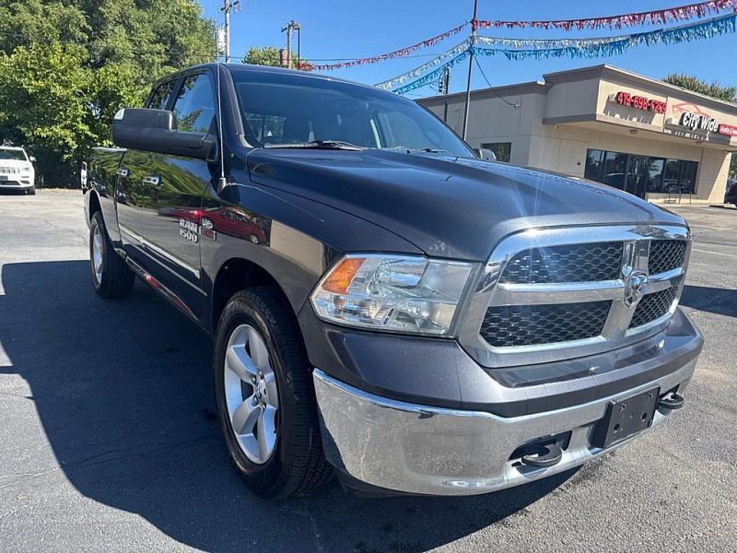 2018 GRAY RAM 1500 SLT Quad Cab 4WD (1C6RR7GM1JS) with an 3.0L V6 DOHC 24V DIESEL engine, 8A transmission, located at 3304 Woodville Road, Northwood, OH, 43619, (419) 210-8019, 41.612694, -83.480743 - Your #1 Destination for Auto Loans and mdash;No Matter Your Credit!At our dealership, we believe everyone deserves the opportunity to drive their dream car and mdash;whether you have good credit, bad credit, or no credit at all. With a wide selection of hundreds of cars, trucks, and SUVs, you'll fin - Photo#6