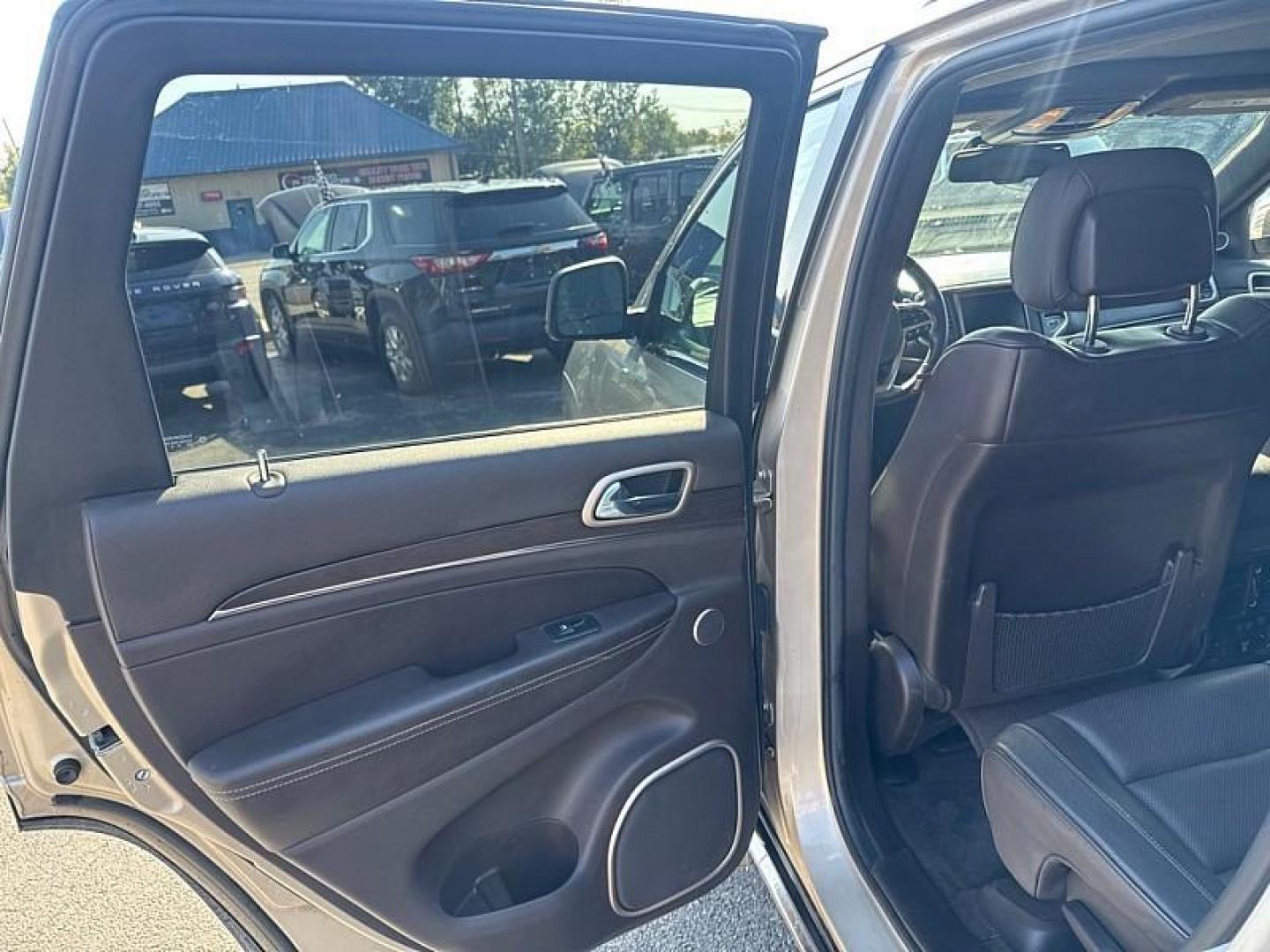 2014 GOLD /BLACK Jeep Grand Cherokee Summit 4WD (1C4RJFJG8EC) with an 3.6L V6 DOHC 24V engine, 5-Speed Automatic transmission, located at 3304 Woodville Road, Northwood, OH, 43619, (419) 210-8019, 41.612694, -83.480743 - Your #1 Destination for Auto Loans and mdash;No Matter Your Credit!At our dealership, we believe everyone deserves the opportunity to drive their dream car and mdash;whether you have good credit, bad credit, or no credit at all. With a wide selection of hundreds of cars, trucks, and SUVs, you'll fin - Photo#10