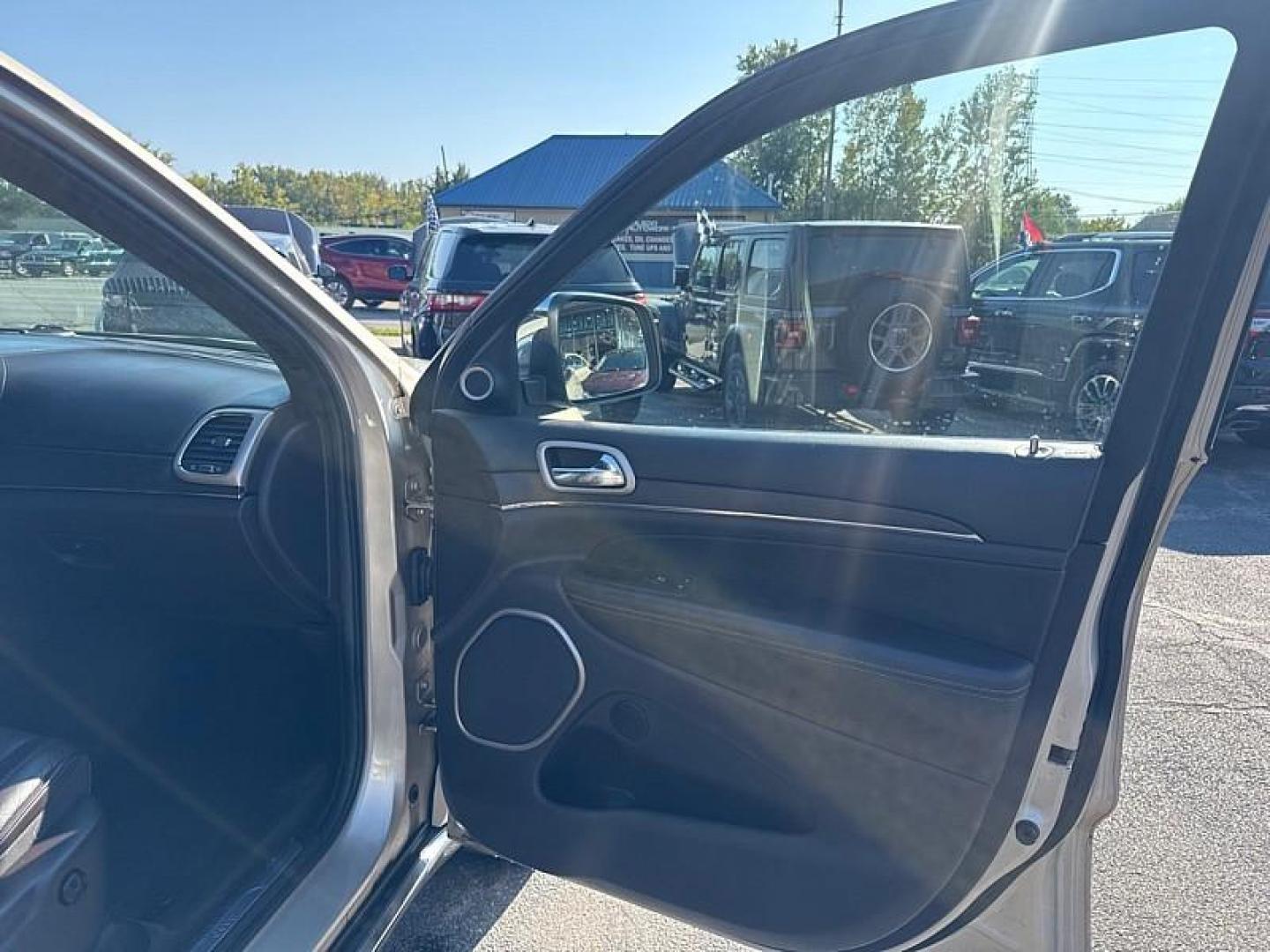 2014 GOLD /BLACK Jeep Grand Cherokee Summit 4WD (1C4RJFJG8EC) with an 3.6L V6 DOHC 24V engine, 5-Speed Automatic transmission, located at 3304 Woodville Road, Northwood, OH, 43619, (419) 210-8019, 41.612694, -83.480743 - Your #1 Destination for Auto Loans and mdash;No Matter Your Credit!At our dealership, we believe everyone deserves the opportunity to drive their dream car and mdash;whether you have good credit, bad credit, or no credit at all. With a wide selection of hundreds of cars, trucks, and SUVs, you'll fin - Photo#15