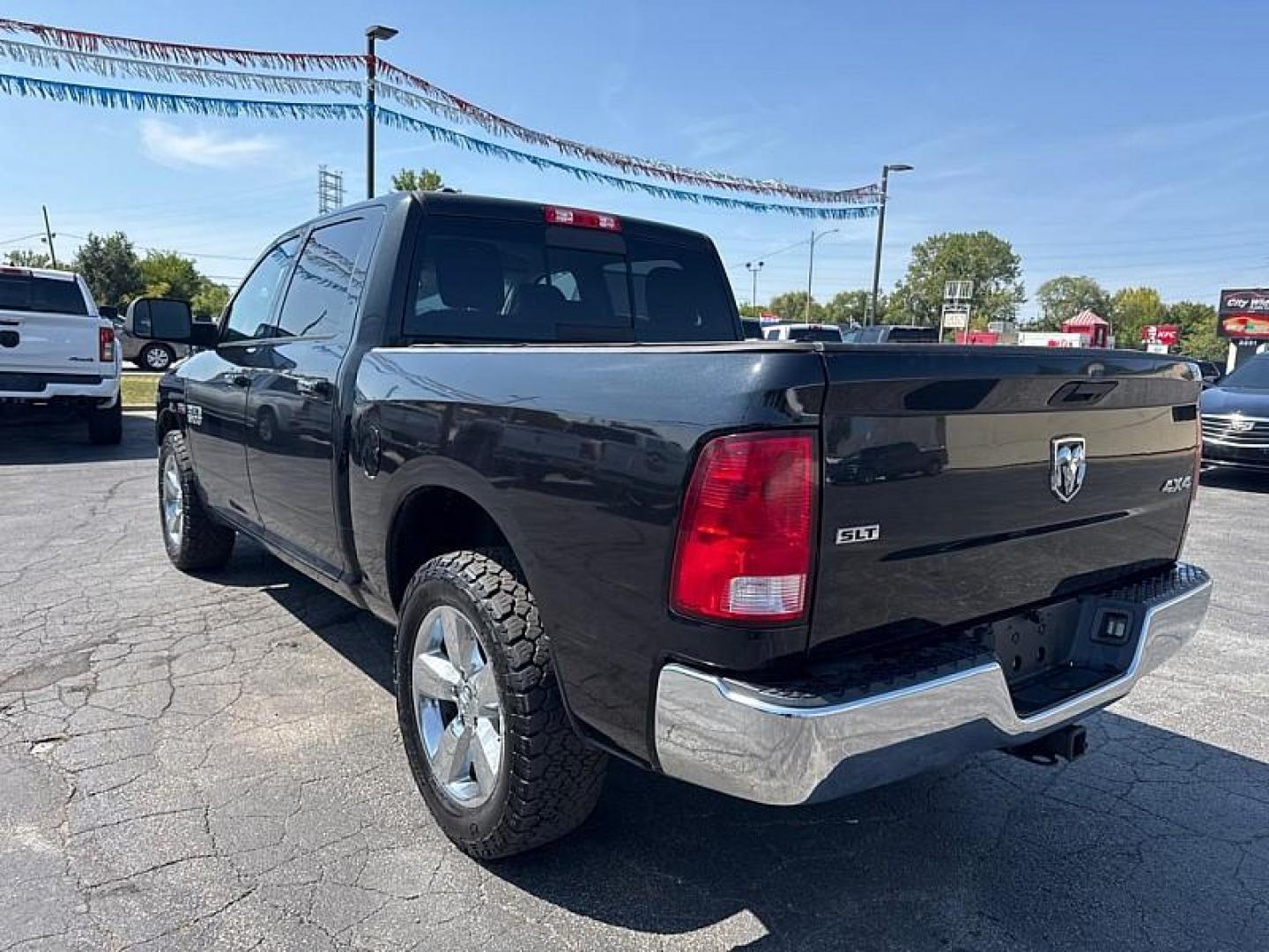 2016 BLACK /BLACK RAM 1500 SLT Crew Cab SWB 4WD (1C6RR7LT5GS) with an 5.7L V8 OHV 16V engine, 6A transmission, located at 3304 Woodville Road, Northwood, OH, 43619, (419) 210-8019, 41.612694, -83.480743 - Your #1 Destination for Auto Loans and mdash;No Matter Your Credit!At our dealership, we believe everyone deserves the opportunity to drive their dream car and mdash;whether you have good credit, bad credit, or no credit at all. With a wide selection of hundreds of cars, trucks, and SUVs, you'll fin - Photo#2