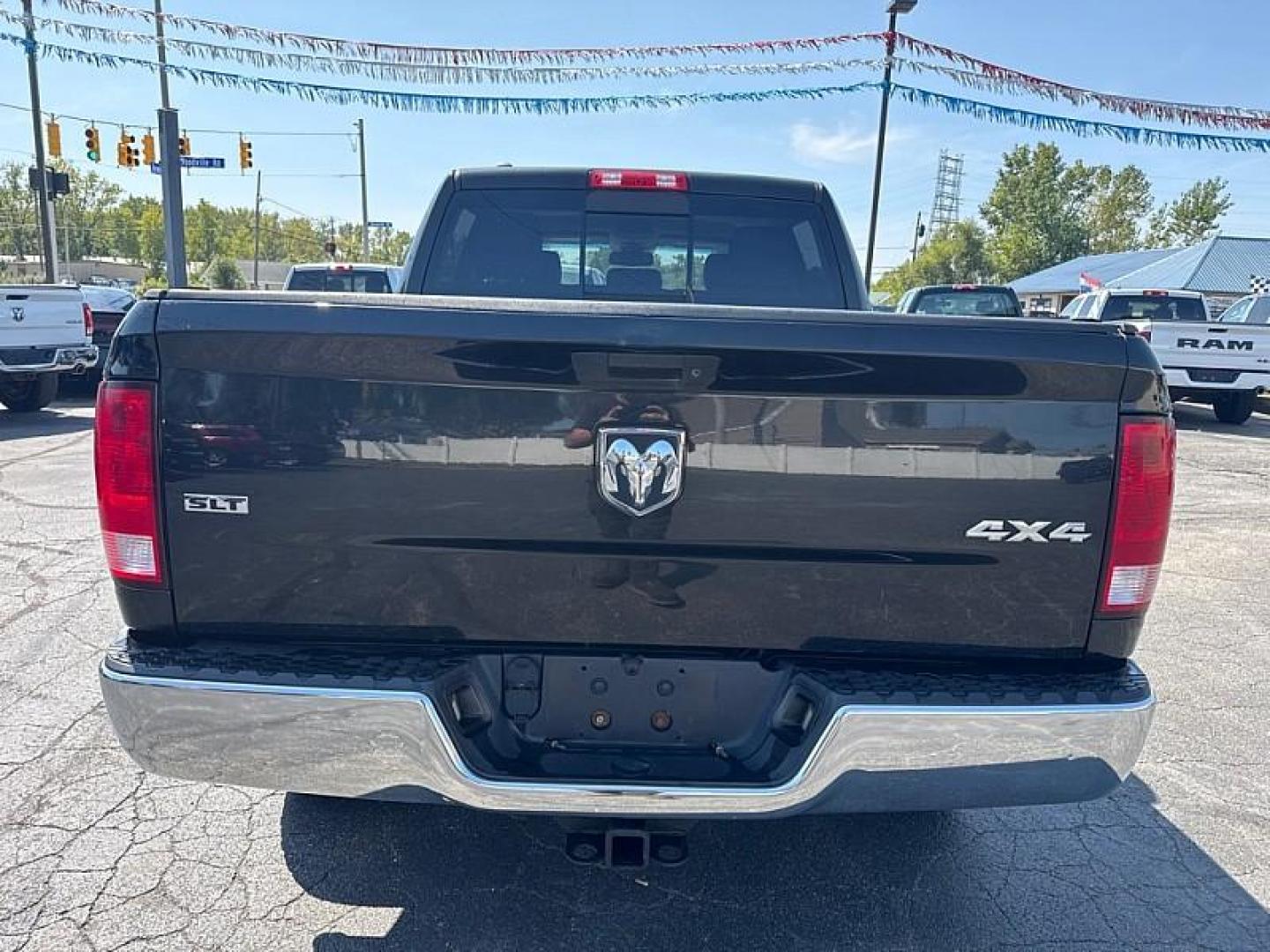 2016 BLACK /BLACK RAM 1500 SLT Crew Cab SWB 4WD (1C6RR7LT5GS) with an 5.7L V8 OHV 16V engine, 6A transmission, located at 3304 Woodville Road, Northwood, OH, 43619, (419) 210-8019, 41.612694, -83.480743 - Your #1 Destination for Auto Loans and mdash;No Matter Your Credit!At our dealership, we believe everyone deserves the opportunity to drive their dream car and mdash;whether you have good credit, bad credit, or no credit at all. With a wide selection of hundreds of cars, trucks, and SUVs, you'll fin - Photo#3