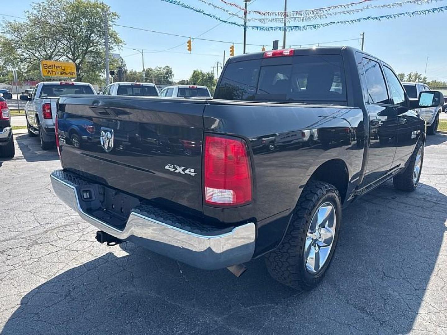 2016 BLACK /BLACK RAM 1500 SLT Crew Cab SWB 4WD (1C6RR7LT5GS) with an 5.7L V8 OHV 16V engine, 6A transmission, located at 3304 Woodville Road, Northwood, OH, 43619, (419) 210-8019, 41.612694, -83.480743 - Your #1 Destination for Auto Loans and mdash;No Matter Your Credit!At our dealership, we believe everyone deserves the opportunity to drive their dream car and mdash;whether you have good credit, bad credit, or no credit at all. With a wide selection of hundreds of cars, trucks, and SUVs, you'll fin - Photo#4