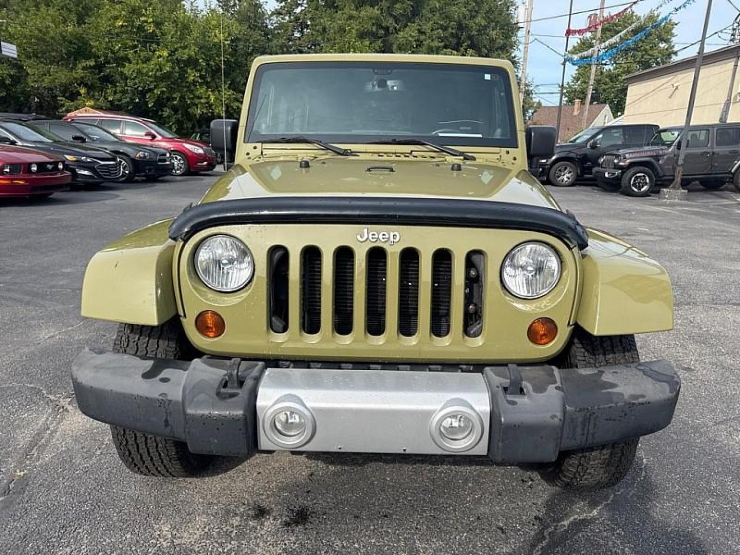 2013 GREEN /BLACK Jeep Wrangler Unlimited Sahara 4WD (1C4BJWEG0DL) with an 3.6L V6 DOHC 24V FFV engine, Automatic 5-Spd transmission, located at 3304 Woodville Road, Northwood, OH, 43619, (419) 210-8019, 41.612694, -83.480743 - Your #1 Destination for Auto Loans and mdash;No Matter Your Credit!At our dealership, we believe everyone deserves the opportunity to drive their dream car and mdash;whether you have good credit, bad credit, or no credit at all. With a wide selection of hundreds of cars, trucks, and SUVs, you'll fin - Photo#7