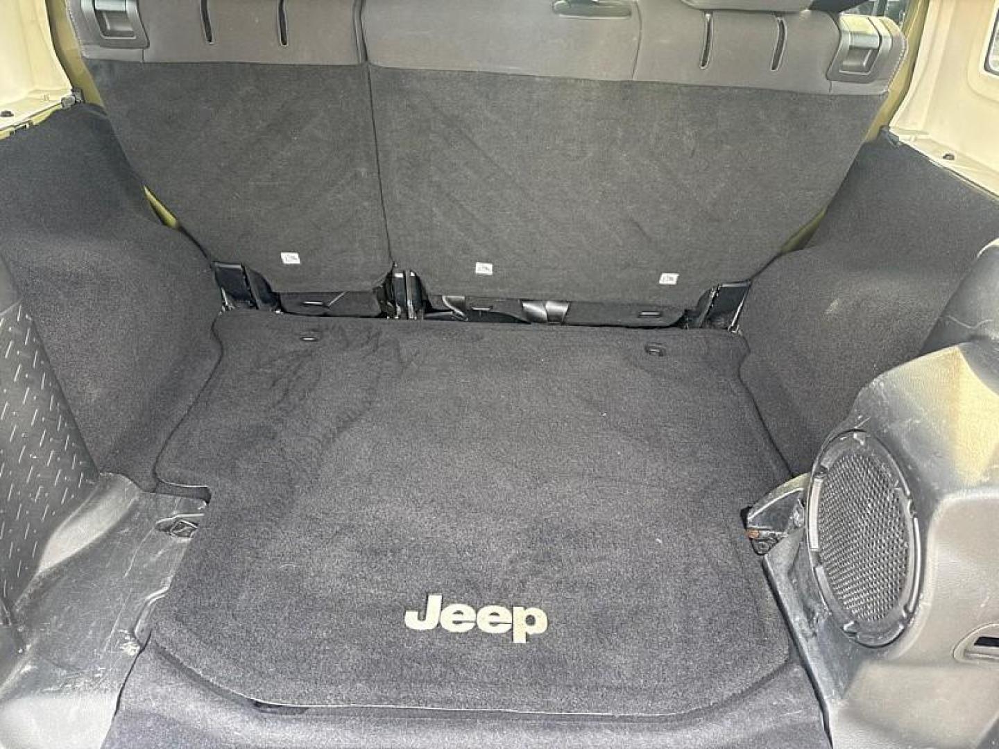 2013 GREEN /BLACK Jeep Wrangler Unlimited Sahara 4WD (1C4BJWEG0DL) with an 3.6L V6 DOHC 24V FFV engine, Automatic 5-Spd transmission, located at 3304 Woodville Road, Northwood, OH, 43619, (419) 210-8019, 41.612694, -83.480743 - Your #1 Destination for Auto Loans and mdash;No Matter Your Credit!At our dealership, we believe everyone deserves the opportunity to drive their dream car and mdash;whether you have good credit, bad credit, or no credit at all. With a wide selection of hundreds of cars, trucks, and SUVs, you'll fin - Photo#12