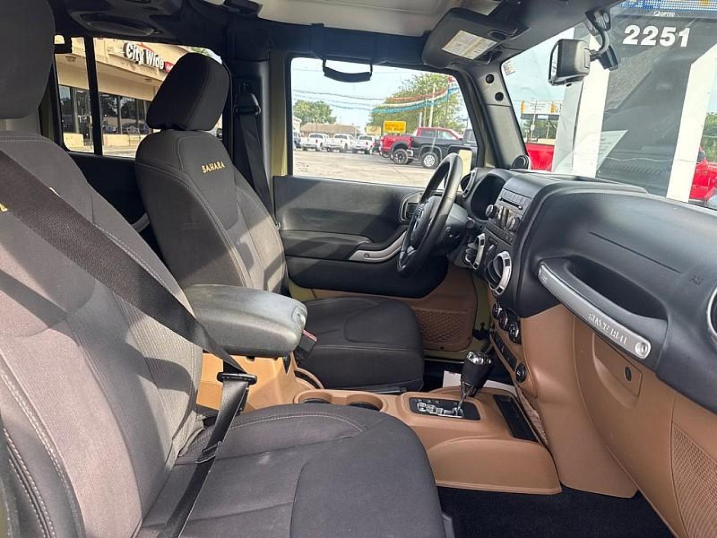 2013 GREEN /BLACK Jeep Wrangler Unlimited Sahara 4WD (1C4BJWEG0DL) with an 3.6L V6 DOHC 24V FFV engine, Automatic 5-Spd transmission, located at 3304 Woodville Road, Northwood, OH, 43619, (419) 210-8019, 41.612694, -83.480743 - Your #1 Destination for Auto Loans and mdash;No Matter Your Credit!At our dealership, we believe everyone deserves the opportunity to drive their dream car and mdash;whether you have good credit, bad credit, or no credit at all. With a wide selection of hundreds of cars, trucks, and SUVs, you'll fin - Photo#16