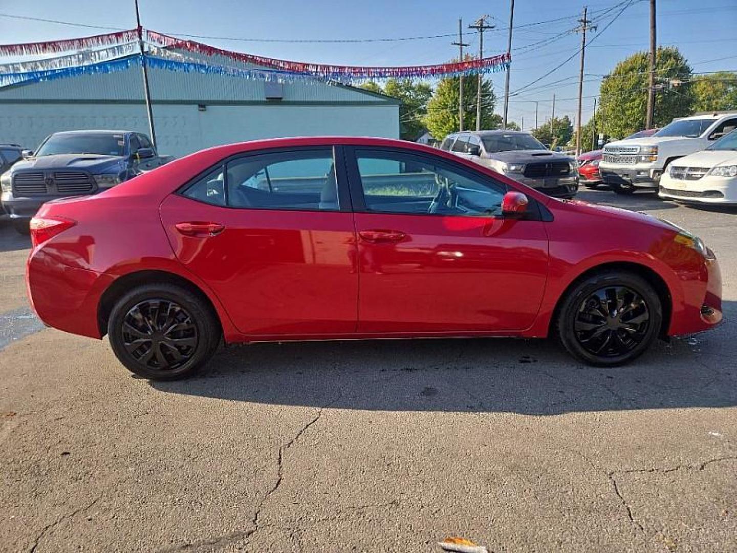 2019 RED /GRAY Toyota Corolla SE CVT (2T1BURHEXKC) with an 1.8L L4 DOHC 16V engine, CVT transmission, located at 3304 Woodville Road, Northwood, OH, 43619, (419) 210-8019, 41.612694, -83.480743 - Your #1 Destination for Auto Loans and mdash;No Matter Your Credit!At our dealership, we believe everyone deserves the opportunity to drive their dream car and mdash;whether you have good credit, bad credit, or no credit at all. With a wide selection of hundreds of cars, trucks, and SUVs, you'll fin - Photo#5