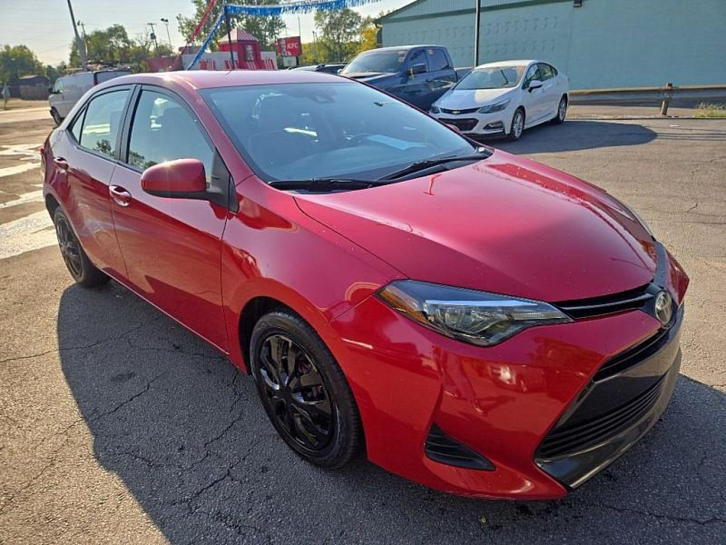 2019 RED /GRAY Toyota Corolla SE CVT (2T1BURHEXKC) with an 1.8L L4 DOHC 16V engine, CVT transmission, located at 3304 Woodville Road, Northwood, OH, 43619, (419) 210-8019, 41.612694, -83.480743 - Your #1 Destination for Auto Loans and mdash;No Matter Your Credit!At our dealership, we believe everyone deserves the opportunity to drive their dream car and mdash;whether you have good credit, bad credit, or no credit at all. With a wide selection of hundreds of cars, trucks, and SUVs, you'll fin - Photo#6