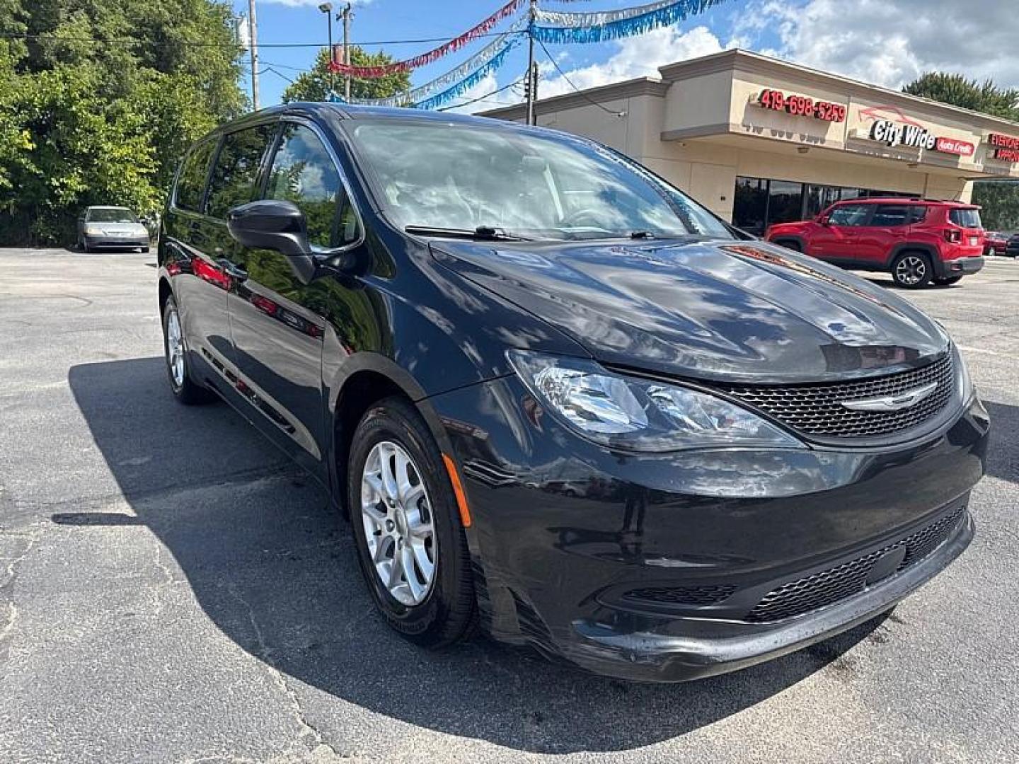 2022 BLACK /BLACK Chrysler Voyager LX (2C4RC1CG2NR) with an 3.6L V6 DOHC 24V engine, 9A transmission, located at 3304 Woodville Road, Northwood, OH, 43619, (419) 210-8019, 41.612694, -83.480743 - Your #1 Destination for Auto Loans and mdash;No Matter Your Credit!At our dealership, we believe everyone deserves the opportunity to drive their dream car and mdash;whether you have good credit, bad credit, or no credit at all. With a wide selection of hundreds of cars, trucks, and SUVs, you'll fin - Photo#6