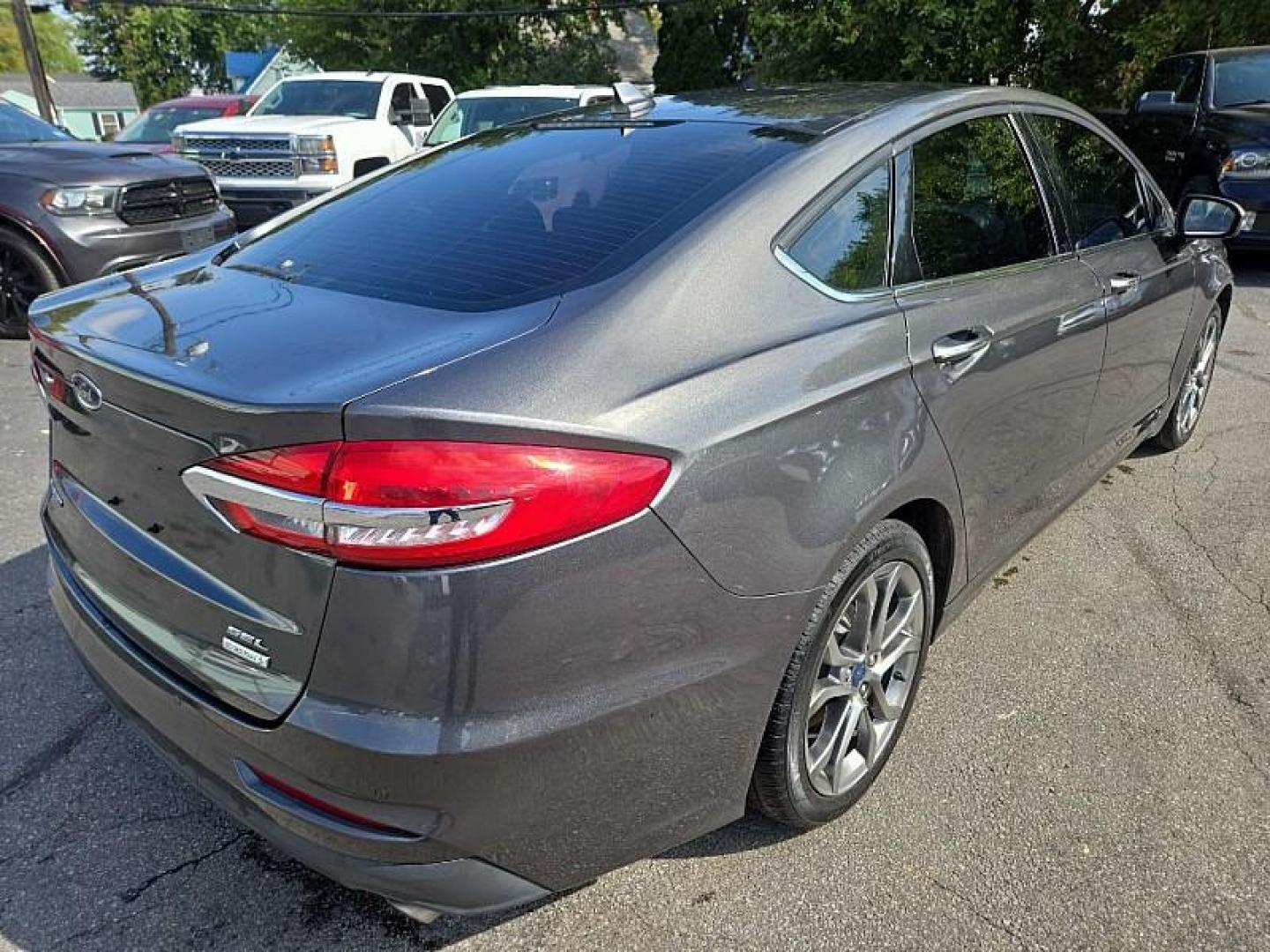 2020 GRAY /BLACK Ford Fusion SEL (3FA6P0CD9LR) with an 1.5L L4 DOHC 16V engine, 6A transmission, located at 3304 Woodville Road, Northwood, OH, 43619, (419) 210-8019, 41.612694, -83.480743 - Your #1 Destination for Auto Loans and mdash;No Matter Your Credit!At our dealership, we believe everyone deserves the opportunity to drive their dream car and mdash;whether you have good credit, bad credit, or no credit at all. With a wide selection of hundreds of cars, trucks, and SUVs, you'll fin - Photo#4