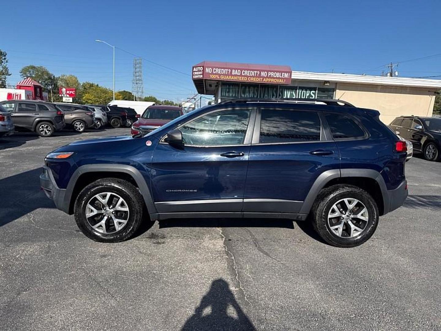 2015 BLUE /BLACK Jeep Cherokee Trailhawk 4WD (1C4PJMBB5FW) with an 2.4L L4 DOHC 16V engine, 9-Speed Automatic transmission, located at 3304 Woodville Road, Northwood, OH, 43619, (419) 210-8019, 41.612694, -83.480743 - Your #1 Destination for Auto Loans and mdash;No Matter Your Credit!At our dealership, we believe everyone deserves the opportunity to drive their dream car and mdash;whether you have good credit, bad credit, or no credit at all. With a wide selection of hundreds of cars, trucks, and SUVs, you'll fin - Photo#1