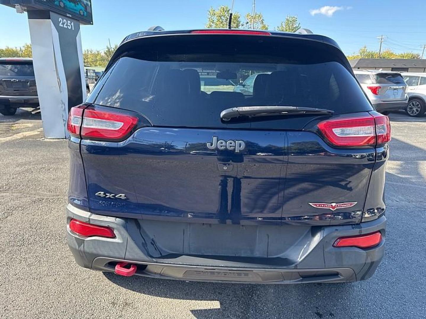 2015 BLUE /BLACK Jeep Cherokee Trailhawk 4WD (1C4PJMBB5FW) with an 2.4L L4 DOHC 16V engine, 9-Speed Automatic transmission, located at 3304 Woodville Road, Northwood, OH, 43619, (419) 210-8019, 41.612694, -83.480743 - Your #1 Destination for Auto Loans and mdash;No Matter Your Credit!At our dealership, we believe everyone deserves the opportunity to drive their dream car and mdash;whether you have good credit, bad credit, or no credit at all. With a wide selection of hundreds of cars, trucks, and SUVs, you'll fin - Photo#3