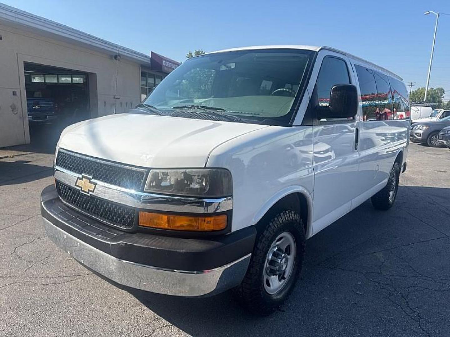 2013 WHITE /BLACK Chevrolet Express LT 3500 (1GAZGYFG7D1) with an 6.0L V8 OHV 16V FFV engine, 6-Speed Automatic transmission, located at 3304 Woodville Road, Northwood, OH, 43619, (419) 210-8019, 41.612694, -83.480743 - Photo#0