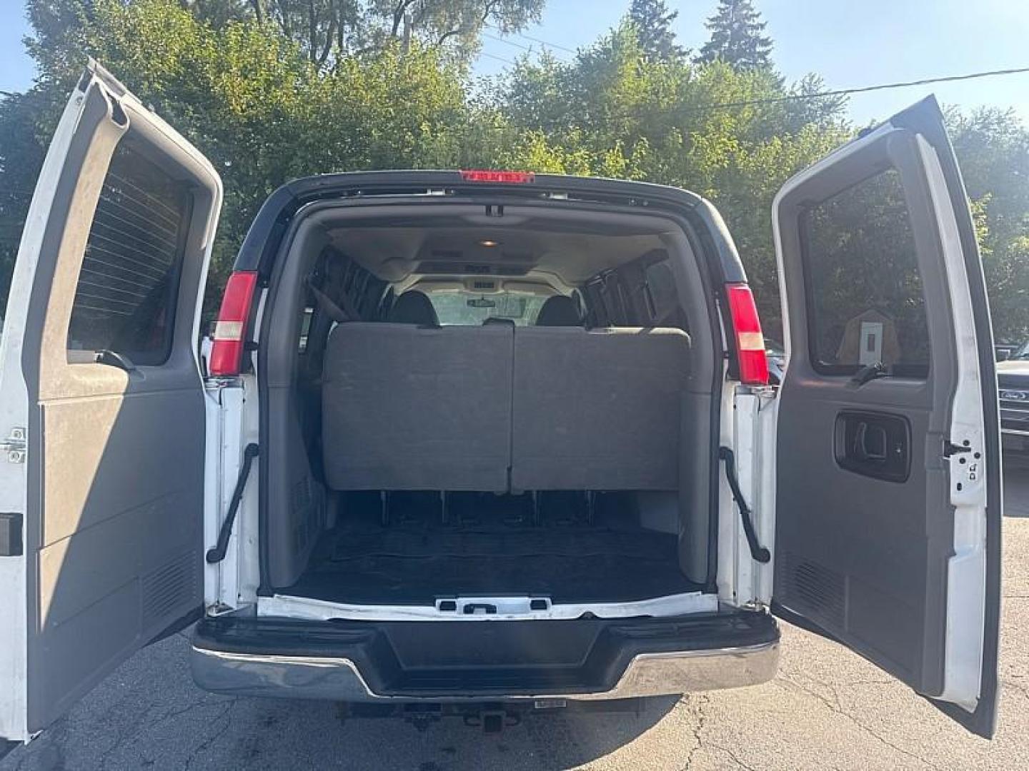 2013 WHITE /BLACK Chevrolet Express LT 3500 (1GAZGYFG7D1) with an 6.0L V8 OHV 16V FFV engine, 6-Speed Automatic transmission, located at 3304 Woodville Road, Northwood, OH, 43619, (419) 210-8019, 41.612694, -83.480743 - Photo#10