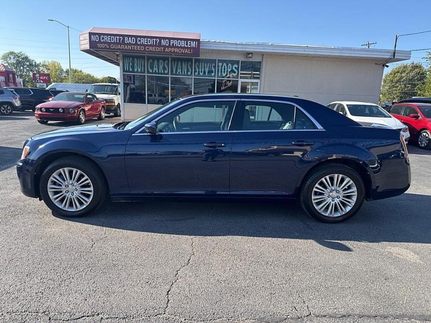 2014 BLUE /BLACK Chrysler 300 AWD (2C3CCARG8EH) with an 3.6L V6 SOHC 24V engine, 8-Speed Automatic transmission, located at 3304 Woodville Road, Northwood, OH, 43619, (419) 210-8019, 41.612694, -83.480743 - Your #1 Destination for Auto Loans and mdash;No Matter Your Credit!At our dealership, we believe everyone deserves the opportunity to drive their dream car and mdash;whether you have good credit, bad credit, or no credit at all. With a wide selection of hundreds of cars, trucks, and SUVs, you'll fin - Photo#1
