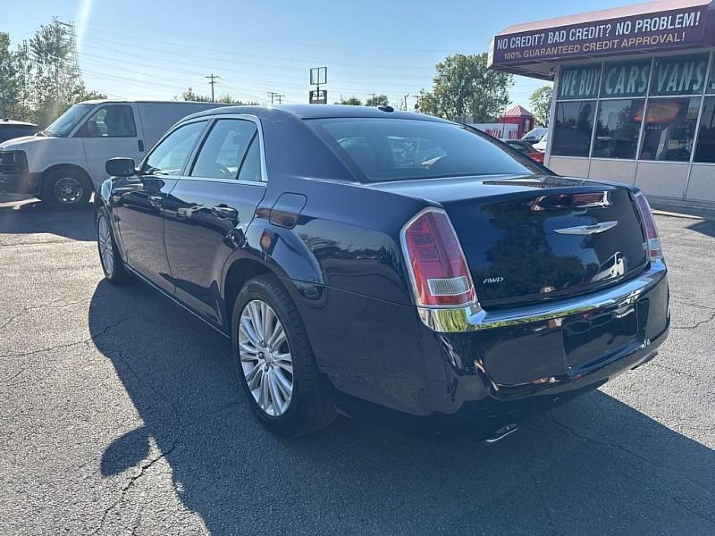 2014 BLUE /BLACK Chrysler 300 AWD (2C3CCARG8EH) with an 3.6L V6 SOHC 24V engine, 8-Speed Automatic transmission, located at 3304 Woodville Road, Northwood, OH, 43619, (419) 210-8019, 41.612694, -83.480743 - Your #1 Destination for Auto Loans and mdash;No Matter Your Credit!At our dealership, we believe everyone deserves the opportunity to drive their dream car and mdash;whether you have good credit, bad credit, or no credit at all. With a wide selection of hundreds of cars, trucks, and SUVs, you'll fin - Photo#2