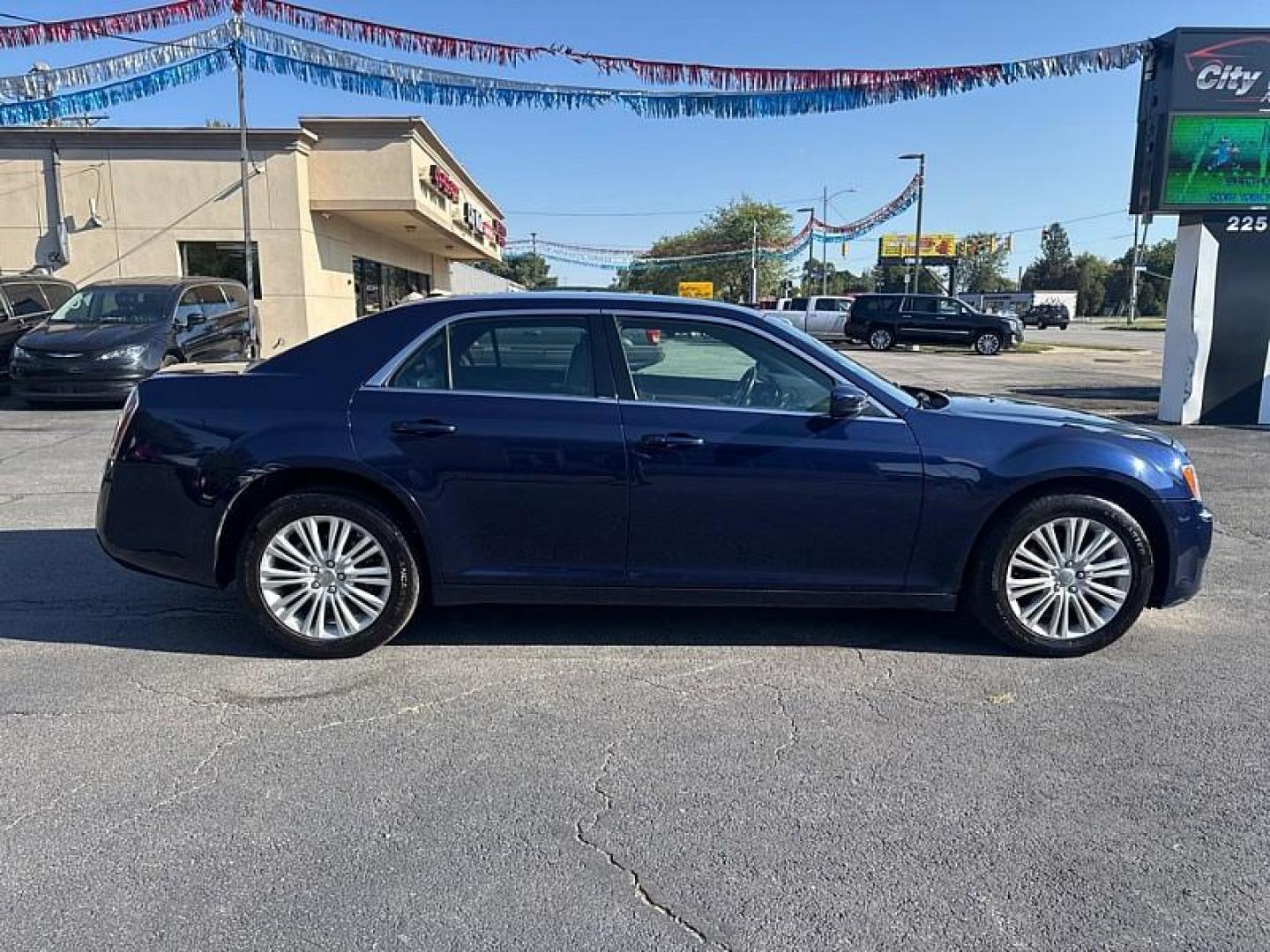 2014 BLUE /BLACK Chrysler 300 AWD (2C3CCARG8EH) with an 3.6L V6 SOHC 24V engine, 8-Speed Automatic transmission, located at 3304 Woodville Road, Northwood, OH, 43619, (419) 210-8019, 41.612694, -83.480743 - Your #1 Destination for Auto Loans and mdash;No Matter Your Credit!At our dealership, we believe everyone deserves the opportunity to drive their dream car and mdash;whether you have good credit, bad credit, or no credit at all. With a wide selection of hundreds of cars, trucks, and SUVs, you'll fin - Photo#5