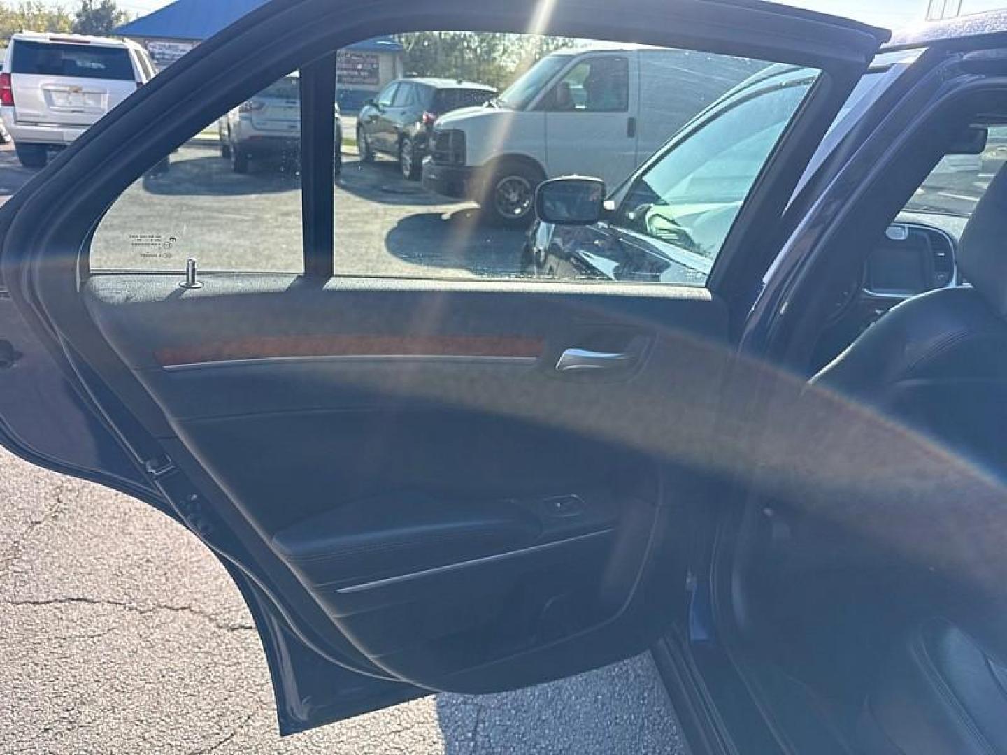 2014 BLUE /BLACK Chrysler 300 AWD (2C3CCARG8EH) with an 3.6L V6 SOHC 24V engine, 8-Speed Automatic transmission, located at 3304 Woodville Road, Northwood, OH, 43619, (419) 210-8019, 41.612694, -83.480743 - Your #1 Destination for Auto Loans and mdash;No Matter Your Credit!At our dealership, we believe everyone deserves the opportunity to drive their dream car and mdash;whether you have good credit, bad credit, or no credit at all. With a wide selection of hundreds of cars, trucks, and SUVs, you'll fin - Photo#9