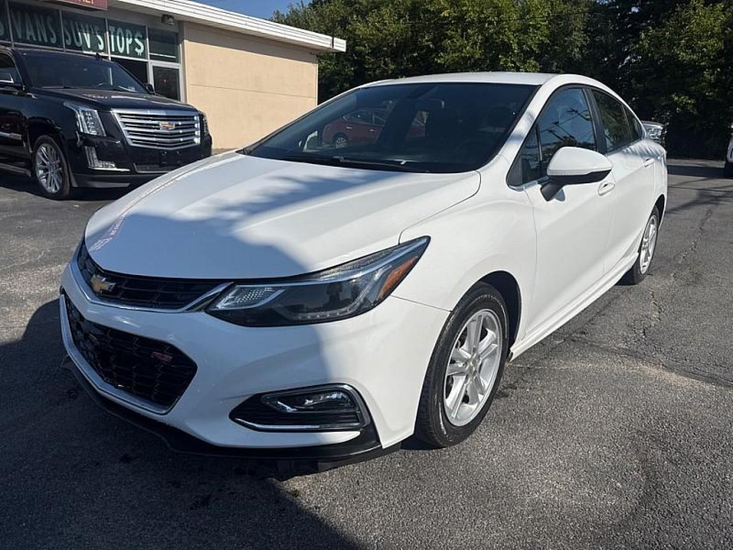 2018 WHITE /BLACK Chevrolet Cruze LT Auto (1G1BE5SM8J7) with an 1.4L L4 DOHC 16V TURBO engine, 6A transmission, located at 3304 Woodville Road, Northwood, OH, 43619, (419) 210-8019, 41.612694, -83.480743 - Photo#0