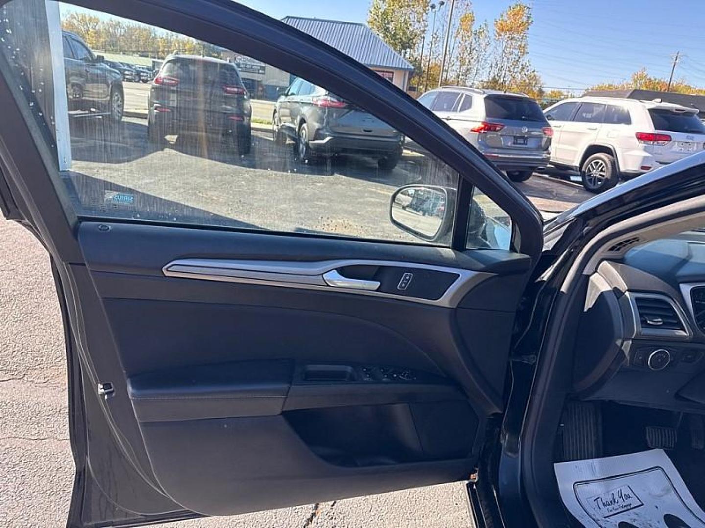 2018 BLACK /BLACK Ford Fusion SE (3FA6P0H75JR) with an 2.5L L4 DOHC 16V engine, 6A transmission, located at 3304 Woodville Road, Northwood, OH, 43619, (419) 210-8019, 41.612694, -83.480743 - Your #1 Destination for Auto Loans and mdash;No Matter Your Credit!At our dealership, we believe everyone deserves the opportunity to drive their dream car and mdash;whether you have good credit, bad credit, or no credit at all. With a wide selection of hundreds of cars, trucks, and SUVs, you'll fin - Photo#8