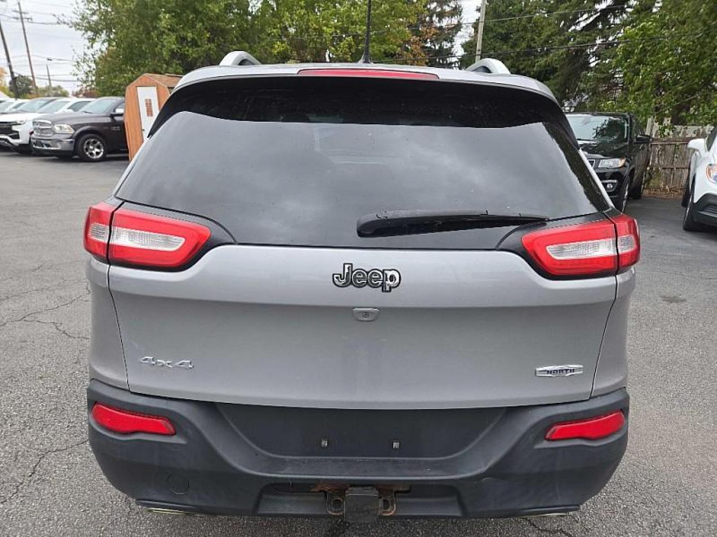 2015 SILVER Jeep Cherokee Latitude 4WD (1C4PJMCS8FW) with an 3.2L V6 DOHC 24V engine, 9-Speed Automatic transmission, located at 3304 Woodville Road, Northwood, OH, 43619, (419) 210-8019, 41.612694, -83.480743 - Your #1 Destination for Auto Loans and mdash;No Matter Your Credit!At our dealership, we believe everyone deserves the opportunity to drive their dream car and mdash;whether you have good credit, bad credit, or no credit at all. With a wide selection of hundreds of cars, trucks, and SUVs, you'll fin - Photo#0