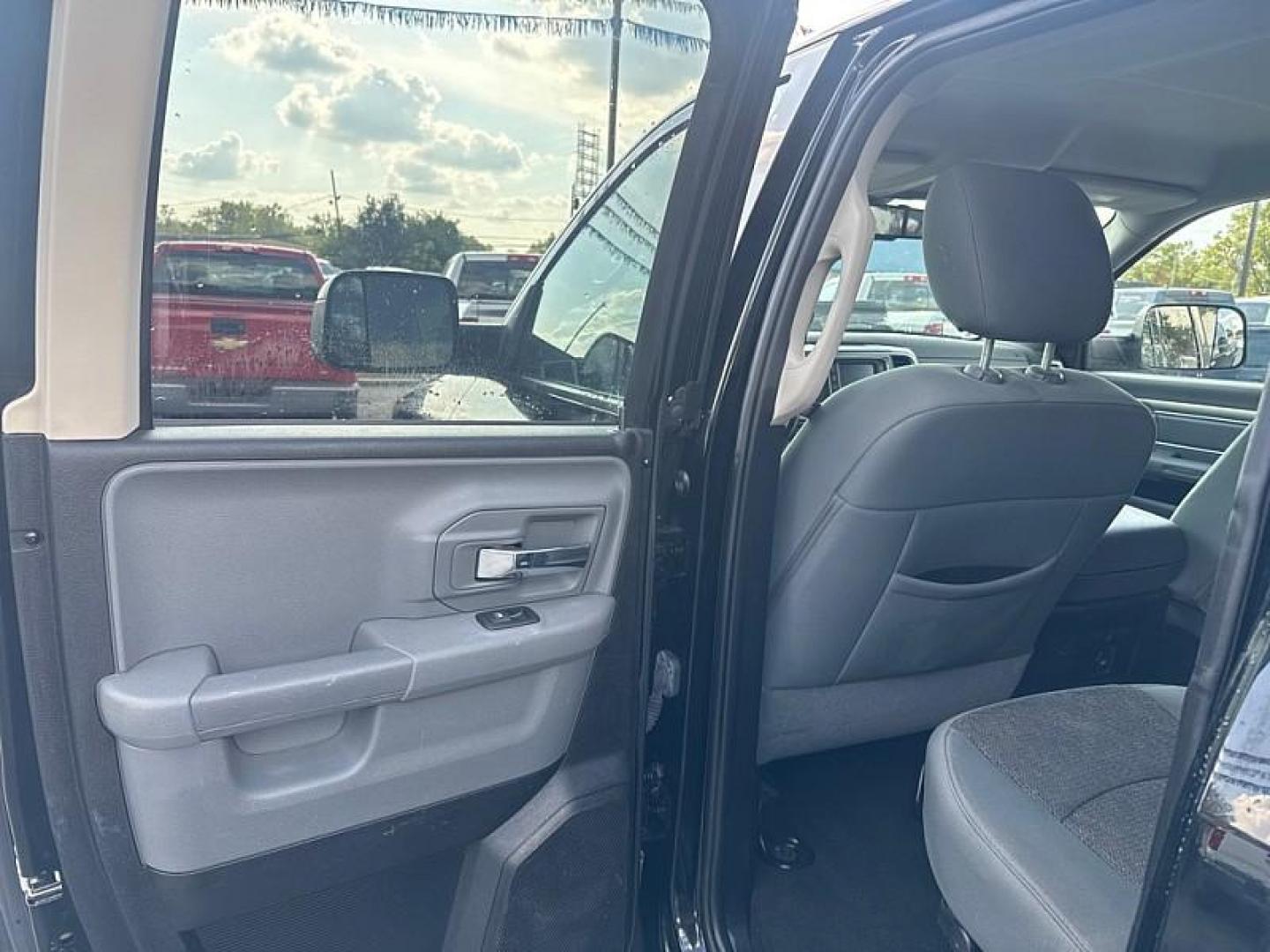 2014 BLACK /BLACK/GRAY RAM 1500 SLT Quad Cab 4WD (1C6RR7GT3ES) with an 5.7L V8 OHV 16V engine, 6-Speed Automatic transmission, located at 3304 Woodville Road, Northwood, OH, 43619, (419) 210-8019, 41.612694, -83.480743 - Your #1 Destination for Auto Loans and mdash;No Matter Your Credit!At our dealership, we believe everyone deserves the opportunity to drive their dream car and mdash;whether you have good credit, bad credit, or no credit at all. With a wide selection of hundreds of cars, trucks, and SUVs, you'll fin - Photo#10