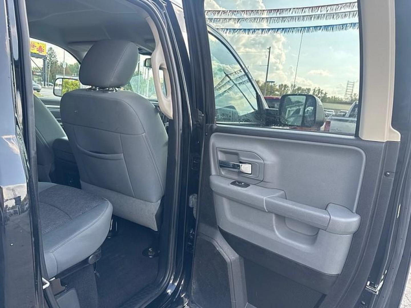 2014 BLACK /BLACK/GRAY RAM 1500 SLT Quad Cab 4WD (1C6RR7GT3ES) with an 5.7L V8 OHV 16V engine, 6-Speed Automatic transmission, located at 3304 Woodville Road, Northwood, OH, 43619, (419) 210-8019, 41.612694, -83.480743 - Your #1 Destination for Auto Loans and mdash;No Matter Your Credit!At our dealership, we believe everyone deserves the opportunity to drive their dream car and mdash;whether you have good credit, bad credit, or no credit at all. With a wide selection of hundreds of cars, trucks, and SUVs, you'll fin - Photo#13