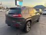 2016 GRAY /BLACK Jeep Cherokee Trailhawk 4WD (1C4PJMBS4GW) with an 3.2L V6 DOHC 24V engine, 9A transmission, located at 3304 Woodville Road, Northwood, OH, 43619, (419) 210-8019, 41.612694, -83.480743 - Your #1 Destination for Auto Loans and mdash;No Matter Your Credit!At our dealership, we believe everyone deserves the opportunity to drive their dream car and mdash;whether you have good credit, bad credit, or no credit at all. With a wide selection of hundreds of cars, trucks, and SUVs, you'll fin - Photo#4