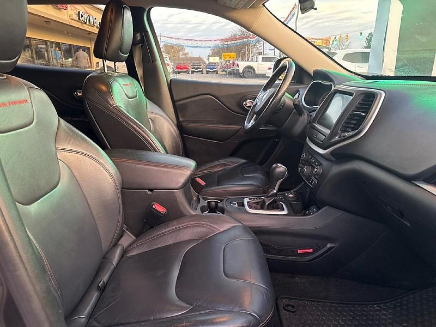 2016 GRAY /BLACK Jeep Cherokee Trailhawk 4WD (1C4PJMBS4GW) with an 3.2L V6 DOHC 24V engine, 9A transmission, located at 3304 Woodville Road, Northwood, OH, 43619, (419) 210-8019, 41.612694, -83.480743 - Your #1 Destination for Auto Loans and mdash;No Matter Your Credit!At our dealership, we believe everyone deserves the opportunity to drive their dream car and mdash;whether you have good credit, bad credit, or no credit at all. With a wide selection of hundreds of cars, trucks, and SUVs, you'll fin - Photo#16