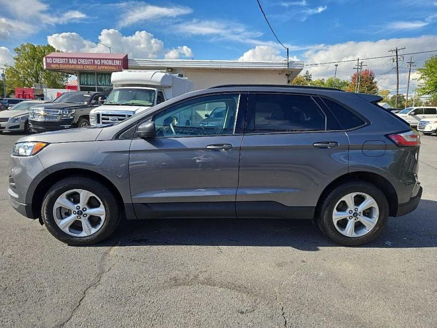 2021 GRAY /BLACK Ford Edge SE AWD (2FMPK4G96MB) with an 2.0L L4 DOHC 16V engine, 6A transmission, located at 3304 Woodville Road, Northwood, OH, 43619, (419) 210-8019, 41.612694, -83.480743 - Your #1 Destination for Auto Loans and mdash;No Matter Your Credit!At our dealership, we believe everyone deserves the opportunity to drive their dream car and mdash;whether you have good credit, bad credit, or no credit at all. With a wide selection of hundreds of cars, trucks, and SUVs, you'll fin - Photo#1