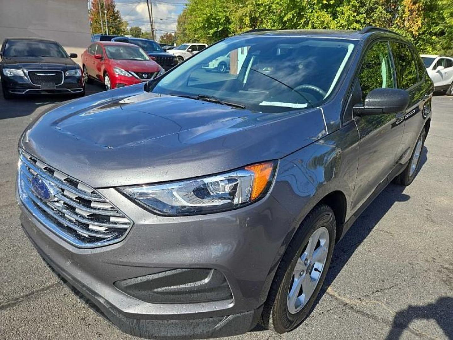 2021 GRAY /BLACK Ford Edge SE AWD (2FMPK4G96MB) with an 2.0L L4 DOHC 16V engine, 6A transmission, located at 3304 Woodville Road, Northwood, OH, 43619, (419) 210-8019, 41.612694, -83.480743 - Your #1 Destination for Auto Loans and mdash;No Matter Your Credit!At our dealership, we believe everyone deserves the opportunity to drive their dream car and mdash;whether you have good credit, bad credit, or no credit at all. With a wide selection of hundreds of cars, trucks, and SUVs, you'll fin - Photo#0