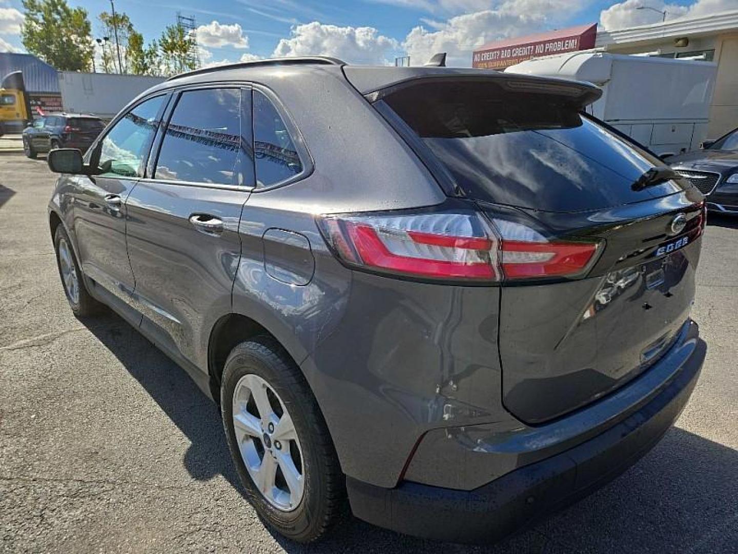 2021 GRAY /BLACK Ford Edge SE AWD (2FMPK4G96MB) with an 2.0L L4 DOHC 16V engine, 6A transmission, located at 3304 Woodville Road, Northwood, OH, 43619, (419) 210-8019, 41.612694, -83.480743 - Your #1 Destination for Auto Loans and mdash;No Matter Your Credit!At our dealership, we believe everyone deserves the opportunity to drive their dream car and mdash;whether you have good credit, bad credit, or no credit at all. With a wide selection of hundreds of cars, trucks, and SUVs, you'll fin - Photo#2