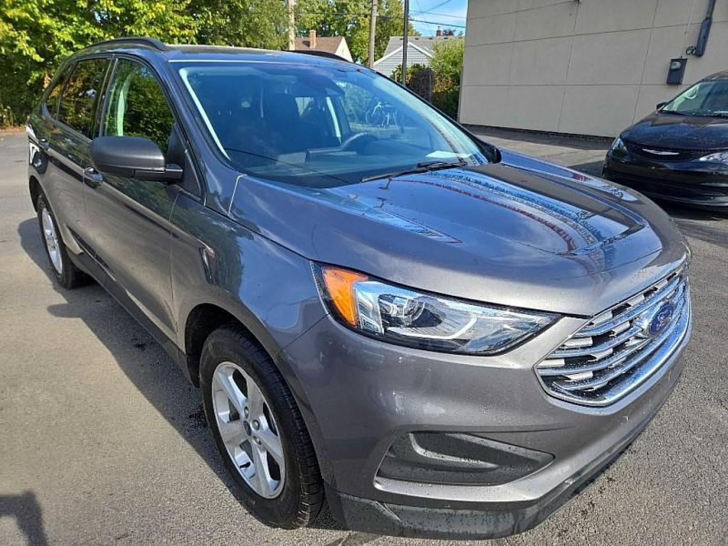 2021 GRAY /BLACK Ford Edge SE AWD (2FMPK4G96MB) with an 2.0L L4 DOHC 16V engine, 6A transmission, located at 3304 Woodville Road, Northwood, OH, 43619, (419) 210-8019, 41.612694, -83.480743 - Your #1 Destination for Auto Loans and mdash;No Matter Your Credit!At our dealership, we believe everyone deserves the opportunity to drive their dream car and mdash;whether you have good credit, bad credit, or no credit at all. With a wide selection of hundreds of cars, trucks, and SUVs, you'll fin - Photo#6