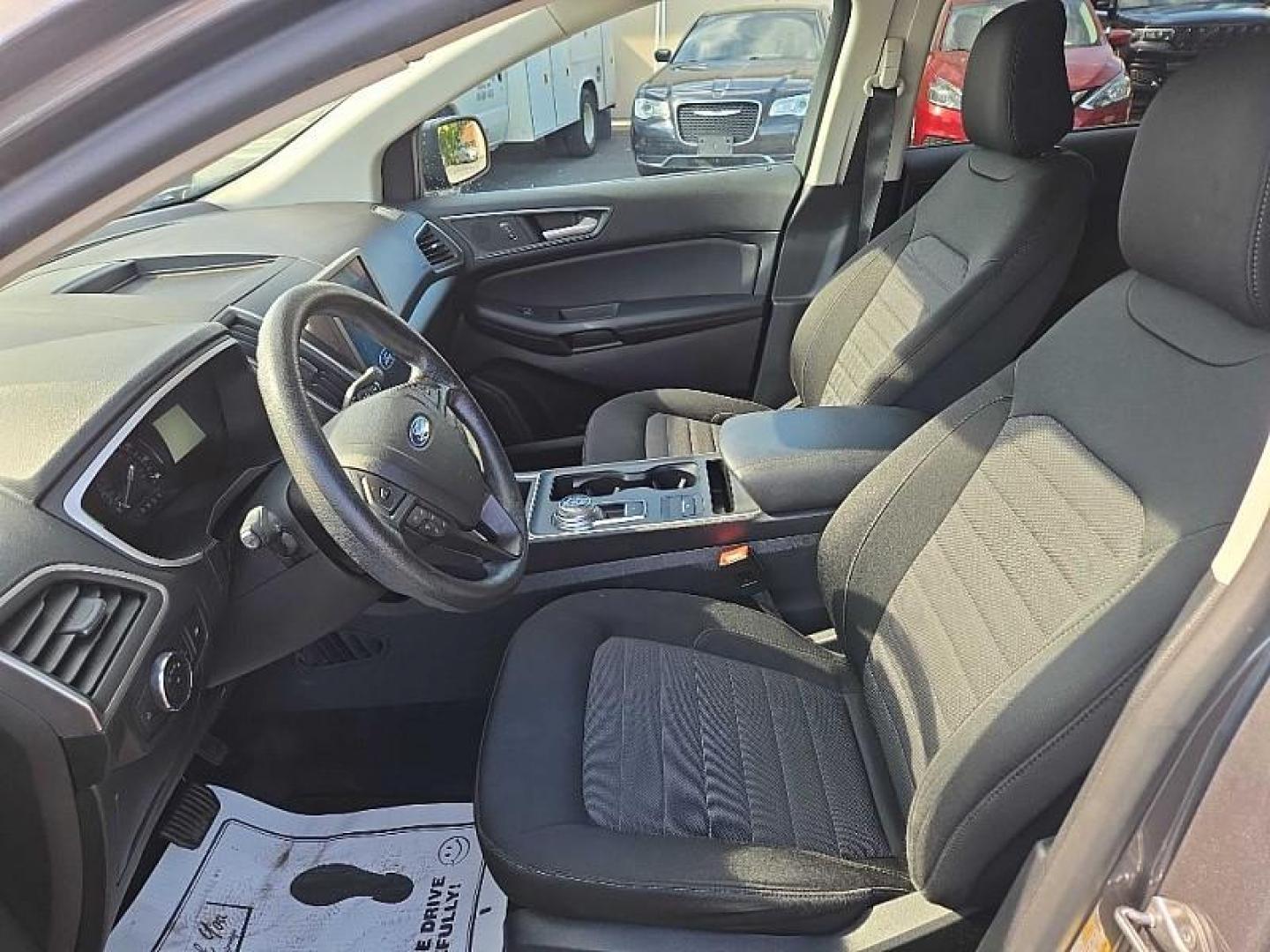 2021 GRAY /BLACK Ford Edge SE AWD (2FMPK4G96MB) with an 2.0L L4 DOHC 16V engine, 6A transmission, located at 3304 Woodville Road, Northwood, OH, 43619, (419) 210-8019, 41.612694, -83.480743 - Your #1 Destination for Auto Loans and mdash;No Matter Your Credit!At our dealership, we believe everyone deserves the opportunity to drive their dream car and mdash;whether you have good credit, bad credit, or no credit at all. With a wide selection of hundreds of cars, trucks, and SUVs, you'll fin - Photo#9