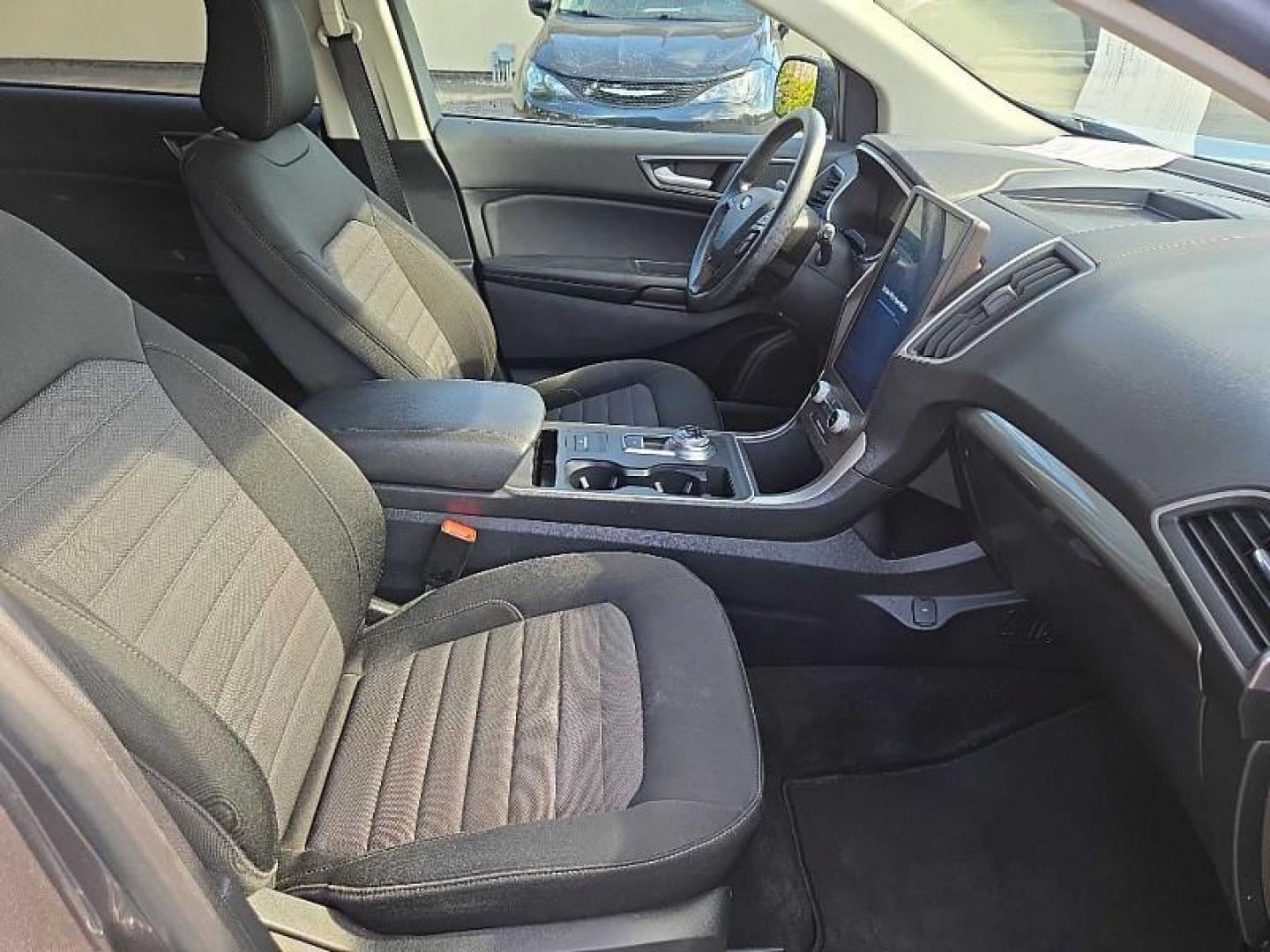 2021 GRAY /BLACK Ford Edge SE AWD (2FMPK4G96MB) with an 2.0L L4 DOHC 16V engine, 6A transmission, located at 3304 Woodville Road, Northwood, OH, 43619, (419) 210-8019, 41.612694, -83.480743 - Your #1 Destination for Auto Loans and mdash;No Matter Your Credit!At our dealership, we believe everyone deserves the opportunity to drive their dream car and mdash;whether you have good credit, bad credit, or no credit at all. With a wide selection of hundreds of cars, trucks, and SUVs, you'll fin - Photo#16