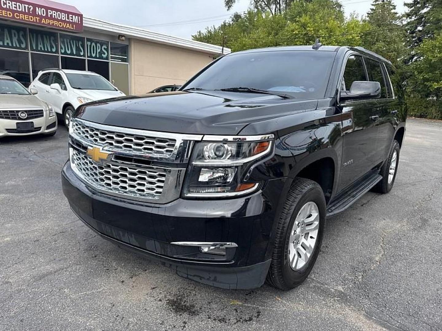 2019 BLACK /BLACK Chevrolet Tahoe LT 2WD (1GNSCBKCXKR) with an 5.3L V8 OHV 16V engine, 6A transmission, located at 3304 Woodville Road, Northwood, OH, 43619, (419) 210-8019, 41.612694, -83.480743 - Your #1 Destination for Auto Loans and mdash;No Matter Your Credit!At our dealership, we believe everyone deserves the opportunity to drive their dream car and mdash;whether you have good credit, bad credit, or no credit at all. With a wide selection of hundreds of cars, trucks, and SUVs, you'll fin - Photo#0