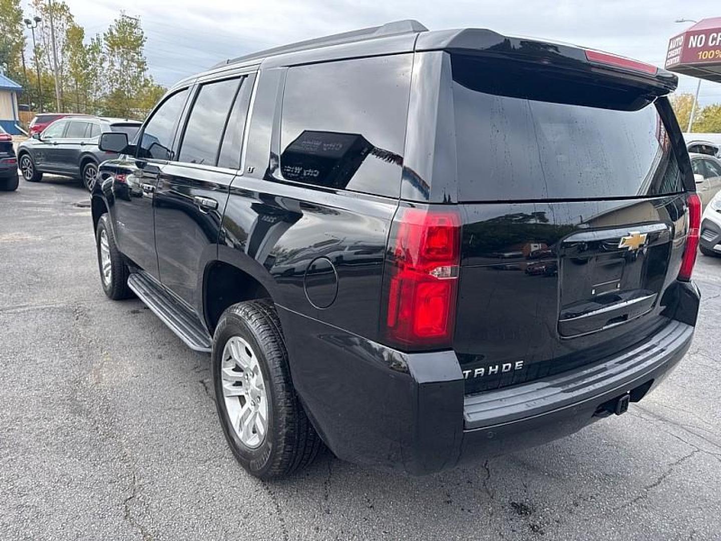 2019 BLACK /BLACK Chevrolet Tahoe LT 2WD (1GNSCBKCXKR) with an 5.3L V8 OHV 16V engine, 6A transmission, located at 3304 Woodville Road, Northwood, OH, 43619, (419) 210-8019, 41.612694, -83.480743 - Your #1 Destination for Auto Loans and mdash;No Matter Your Credit!At our dealership, we believe everyone deserves the opportunity to drive their dream car and mdash;whether you have good credit, bad credit, or no credit at all. With a wide selection of hundreds of cars, trucks, and SUVs, you'll fin - Photo#2