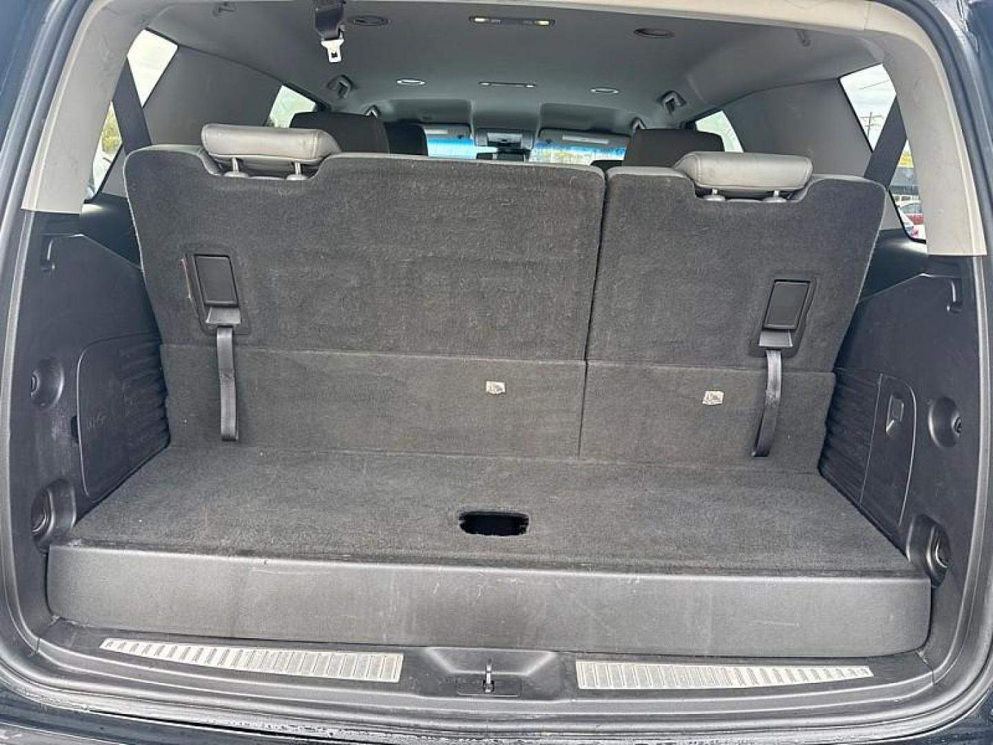 2019 BLACK /BLACK Chevrolet Tahoe LT 2WD (1GNSCBKCXKR) with an 5.3L V8 OHV 16V engine, 6A transmission, located at 3304 Woodville Road, Northwood, OH, 43619, (419) 210-8019, 41.612694, -83.480743 - Your #1 Destination for Auto Loans and mdash;No Matter Your Credit!At our dealership, we believe everyone deserves the opportunity to drive their dream car and mdash;whether you have good credit, bad credit, or no credit at all. With a wide selection of hundreds of cars, trucks, and SUVs, you'll fin - Photo#13