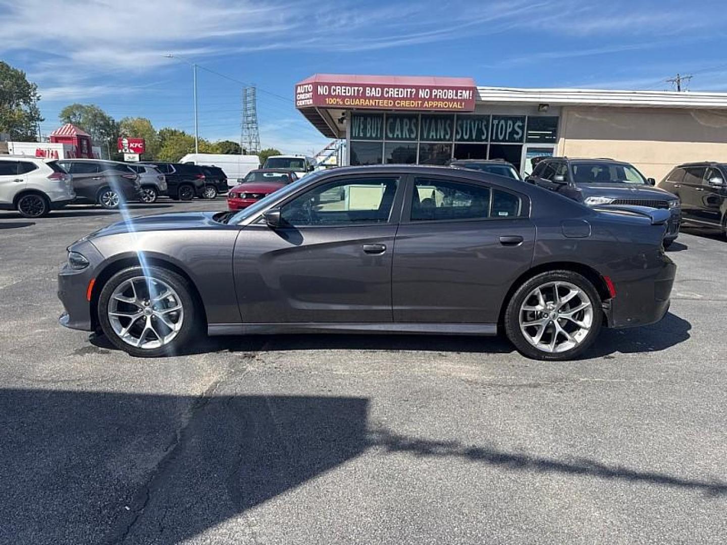 2022 GRAY /BLACK Dodge Charger GT (2C3CDXHGXNH) with an 3.6L V6 DOHC 24V engine, 8A transmission, located at 3304 Woodville Road, Northwood, OH, 43619, (419) 210-8019, 41.612694, -83.480743 - Your #1 Destination for Auto Loans and mdash;No Matter Your Credit!At our dealership, we believe everyone deserves the opportunity to drive their dream car and mdash;whether you have good credit, bad credit, or no credit at all. With a wide selection of hundreds of cars, trucks, and SUVs, you'll fin - Photo#1