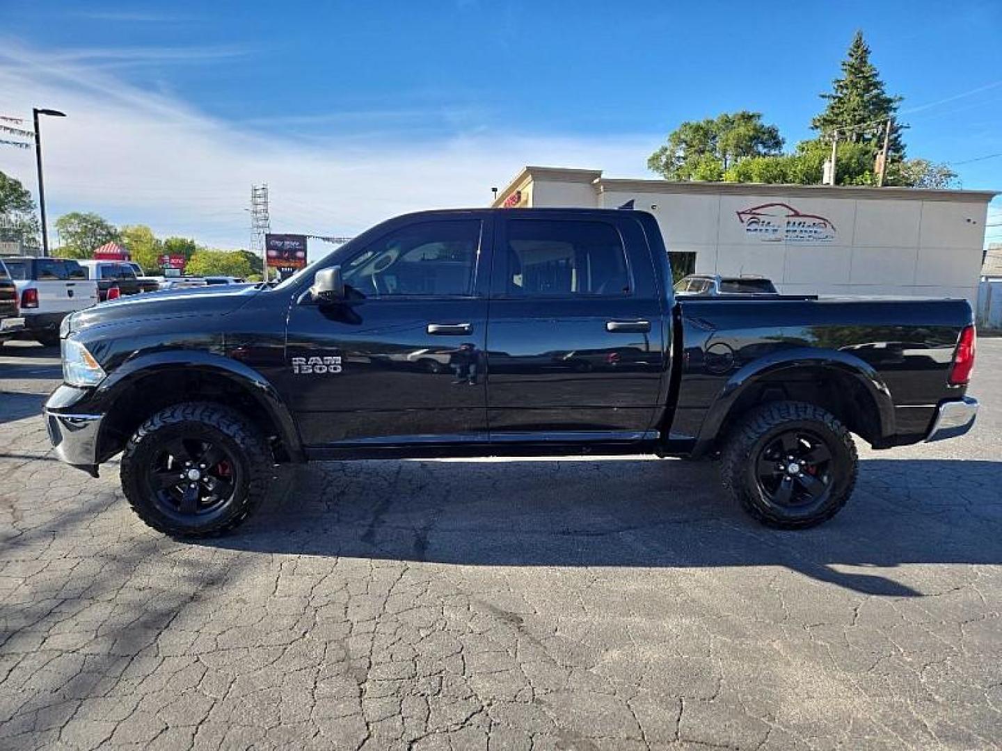 2015 GRAY /BLACK RAM 1500 SLT Crew Cab SWB 4WD (1C6RR7LG8FS) with an 3.6L V6 DOHC 24V FFV engine, 6-Speed Automatic transmission, located at 3304 Woodville Road, Northwood, OH, 43619, (419) 210-8019, 41.612694, -83.480743 - Your #1 Destination for Auto Loans and mdash;No Matter Your Credit!At our dealership, we believe everyone deserves the opportunity to drive their dream car and mdash;whether you have good credit, bad credit, or no credit at all. With a wide selection of hundreds of cars, trucks, and SUVs, you'll fin - Photo#1