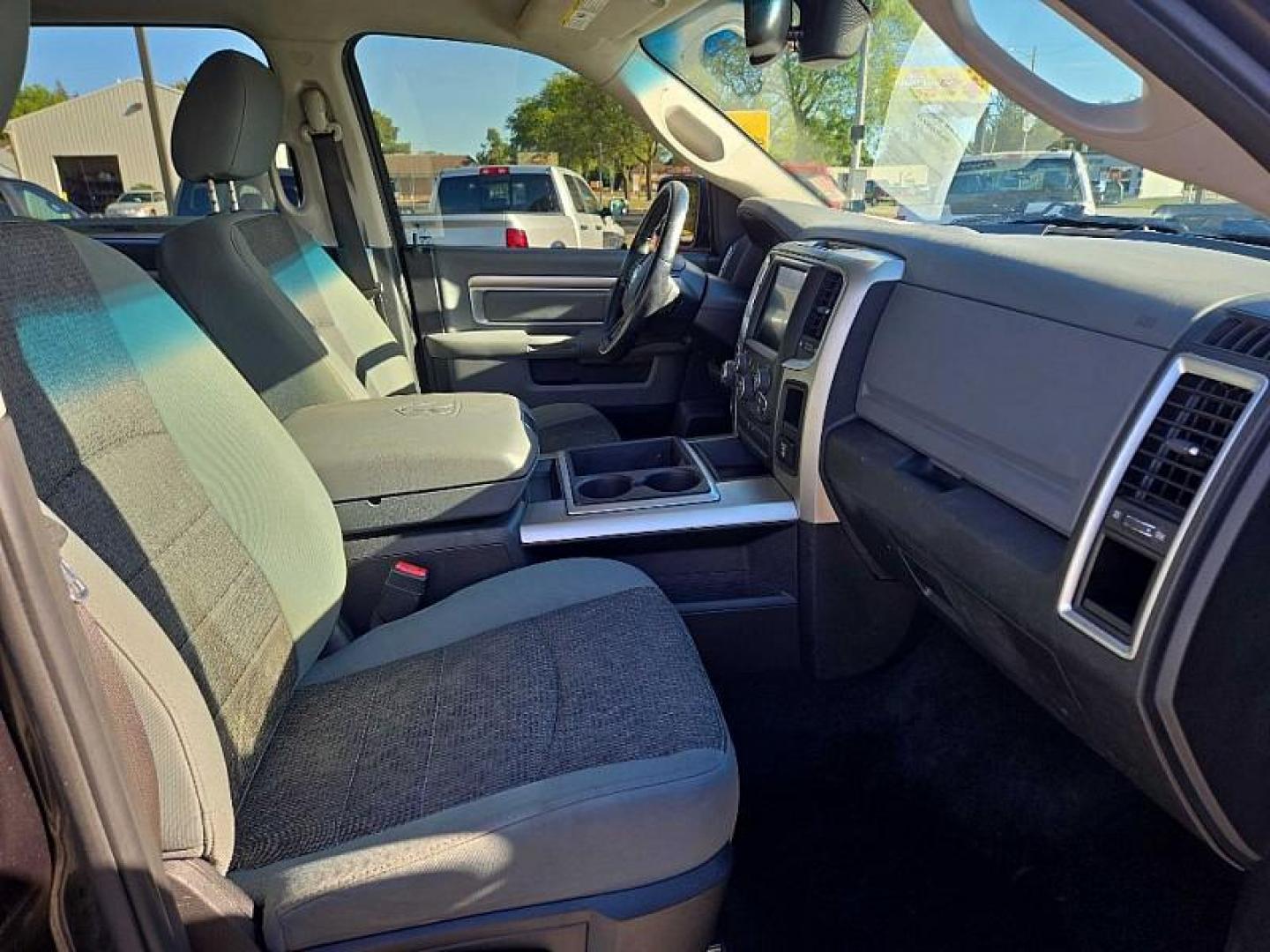 2015 GRAY /BLACK RAM 1500 SLT Crew Cab SWB 4WD (1C6RR7LG8FS) with an 3.6L V6 DOHC 24V FFV engine, 6-Speed Automatic transmission, located at 3304 Woodville Road, Northwood, OH, 43619, (419) 210-8019, 41.612694, -83.480743 - Your #1 Destination for Auto Loans and mdash;No Matter Your Credit!At our dealership, we believe everyone deserves the opportunity to drive their dream car and mdash;whether you have good credit, bad credit, or no credit at all. With a wide selection of hundreds of cars, trucks, and SUVs, you'll fin - Photo#15