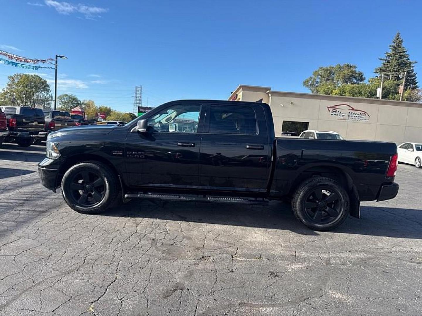 2018 BLACK /BLACK RAM 1500 SLT Crew Cab SWB 4WD (1C6RR7LT1JS) with an 5.7L V8 OHV 16V engine, 8A transmission, located at 3304 Woodville Road, Northwood, OH, 43619, (419) 210-8019, 41.612694, -83.480743 - Your #1 Destination for Auto Loans and mdash;No Matter Your Credit!At our dealership, we believe everyone deserves the opportunity to drive their dream car and mdash;whether you have good credit, bad credit, or no credit at all. With a wide selection of hundreds of cars, trucks, and SUVs, you'll fin - Photo#1