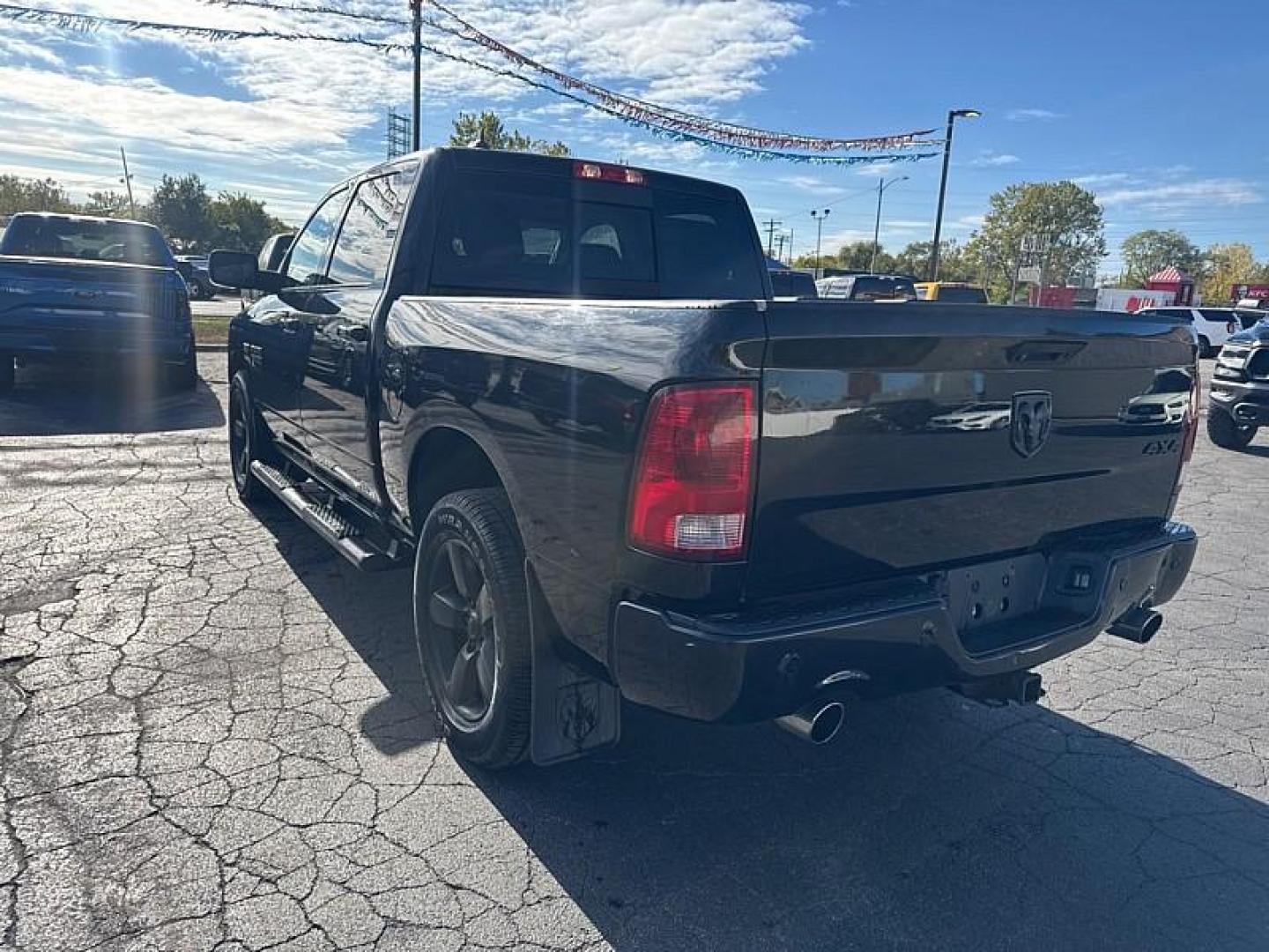 2018 BLACK /BLACK RAM 1500 SLT Crew Cab SWB 4WD (1C6RR7LT1JS) with an 5.7L V8 OHV 16V engine, 8A transmission, located at 3304 Woodville Road, Northwood, OH, 43619, (419) 210-8019, 41.612694, -83.480743 - Your #1 Destination for Auto Loans and mdash;No Matter Your Credit!At our dealership, we believe everyone deserves the opportunity to drive their dream car and mdash;whether you have good credit, bad credit, or no credit at all. With a wide selection of hundreds of cars, trucks, and SUVs, you'll fin - Photo#2