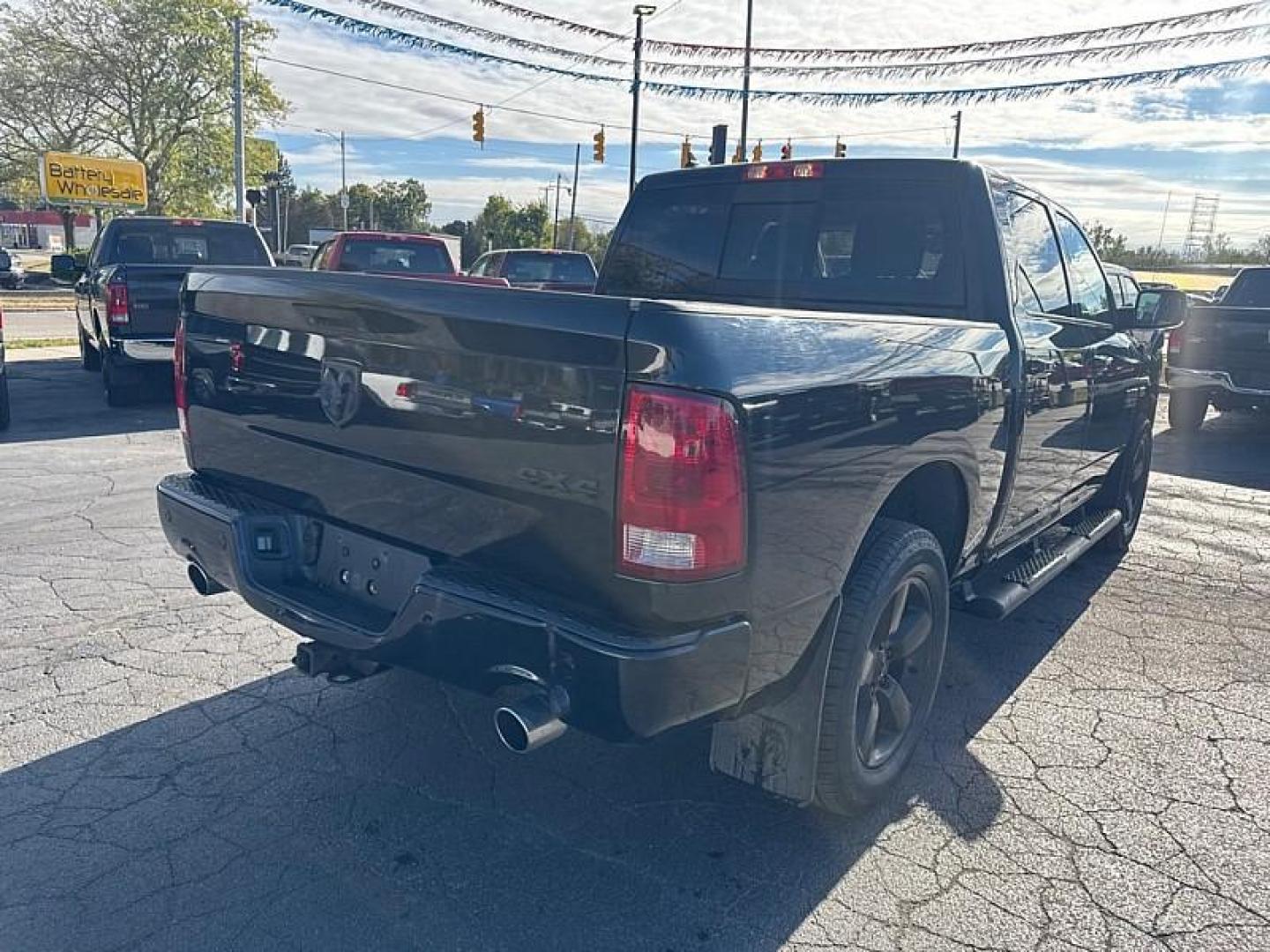 2018 BLACK /BLACK RAM 1500 SLT Crew Cab SWB 4WD (1C6RR7LT1JS) with an 5.7L V8 OHV 16V engine, 8A transmission, located at 3304 Woodville Road, Northwood, OH, 43619, (419) 210-8019, 41.612694, -83.480743 - Your #1 Destination for Auto Loans and mdash;No Matter Your Credit!At our dealership, we believe everyone deserves the opportunity to drive their dream car and mdash;whether you have good credit, bad credit, or no credit at all. With a wide selection of hundreds of cars, trucks, and SUVs, you'll fin - Photo#4